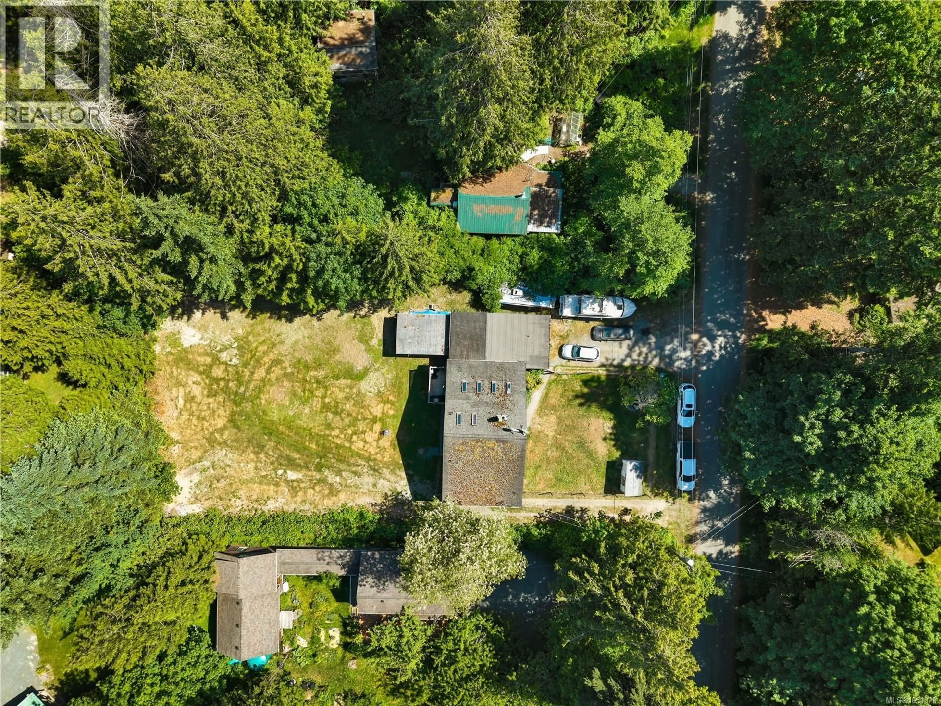 A pic from outside/outdoor area/front of a property/back of a property/a pic from drone, forest/trees view for 1376 HOOLEY ROAD, Quadra Island British Columbia V0P1N0