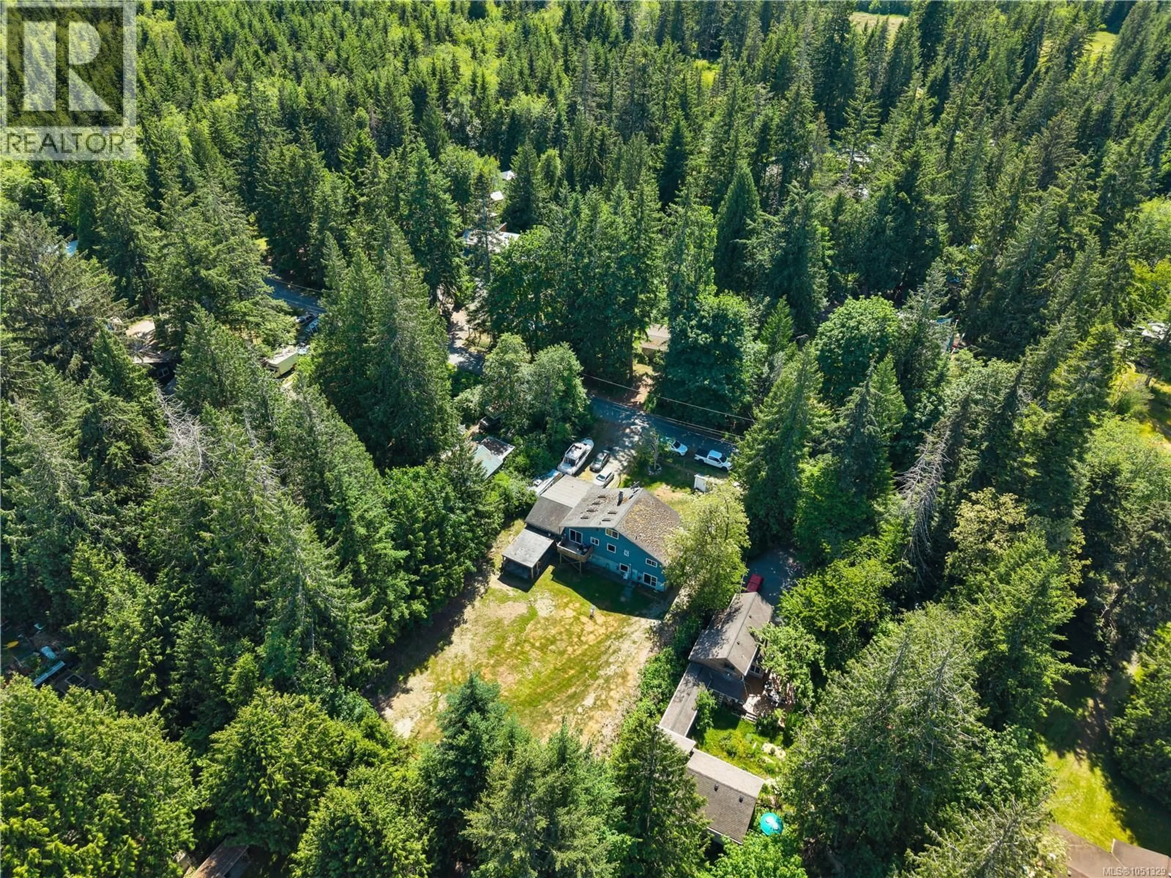 A pic from outside/outdoor area/front of a property/back of a property/a pic from drone, forest/trees view for 1376 HOOLEY ROAD, Quadra Island British Columbia V0P1N0