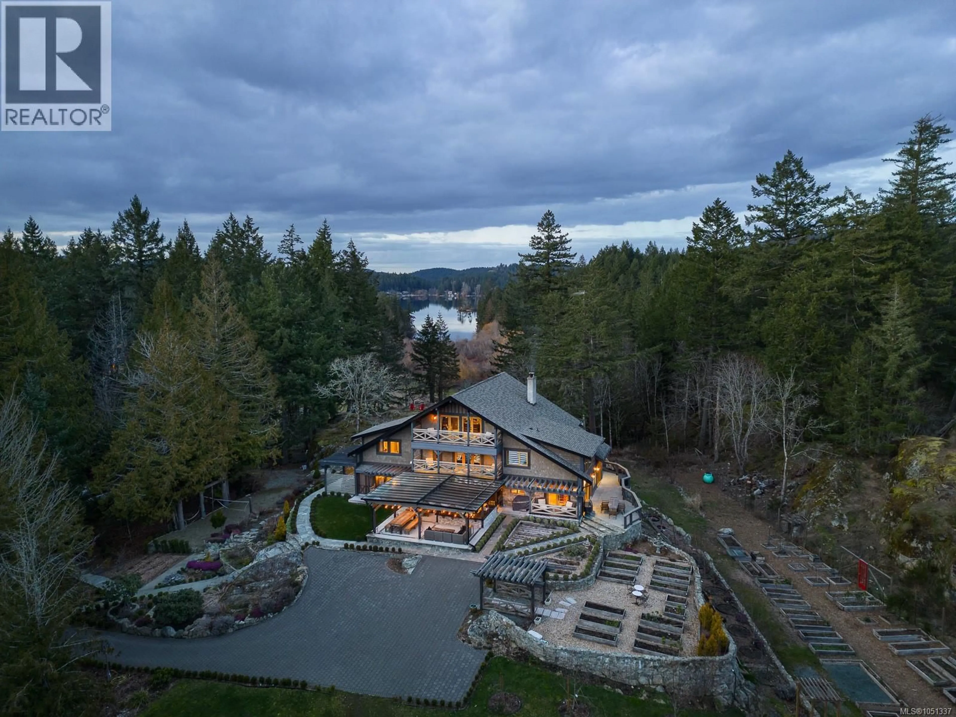 A pic from outside/outdoor area/front of a property/back of a property/a pic from drone, water/lake/river/ocean view for 4573 PROSPECT LAKE ROAD, Saanich British Columbia V9E1J3