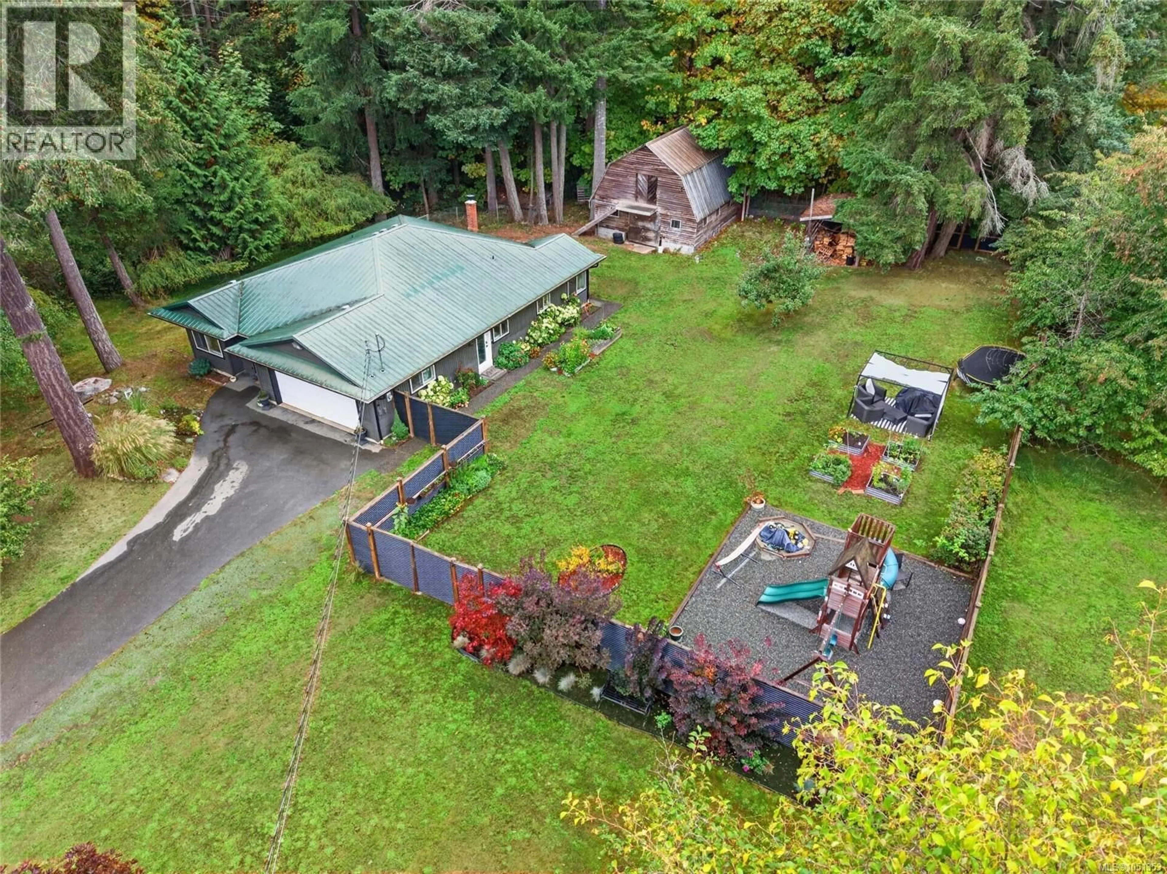 A pic from outside/outdoor area/front of a property/back of a property/a pic from drone, forest/trees view for 936 ARDEN ROAD, Courtenay British Columbia V9N9K3