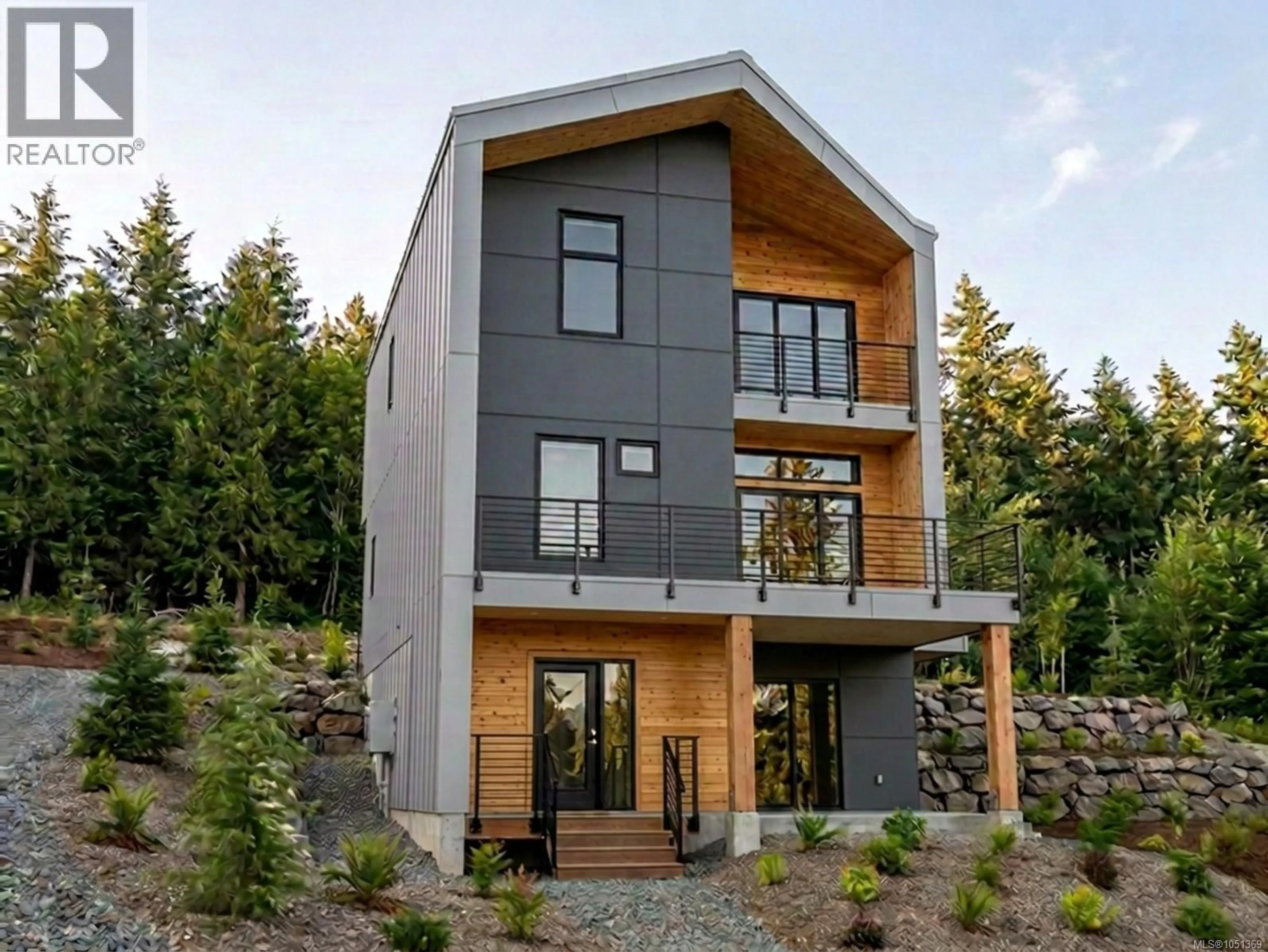 Home with brick exterior material, unknown for 1032 SHORE PINE DRIVE, Ucluelet British Columbia V0R3A0