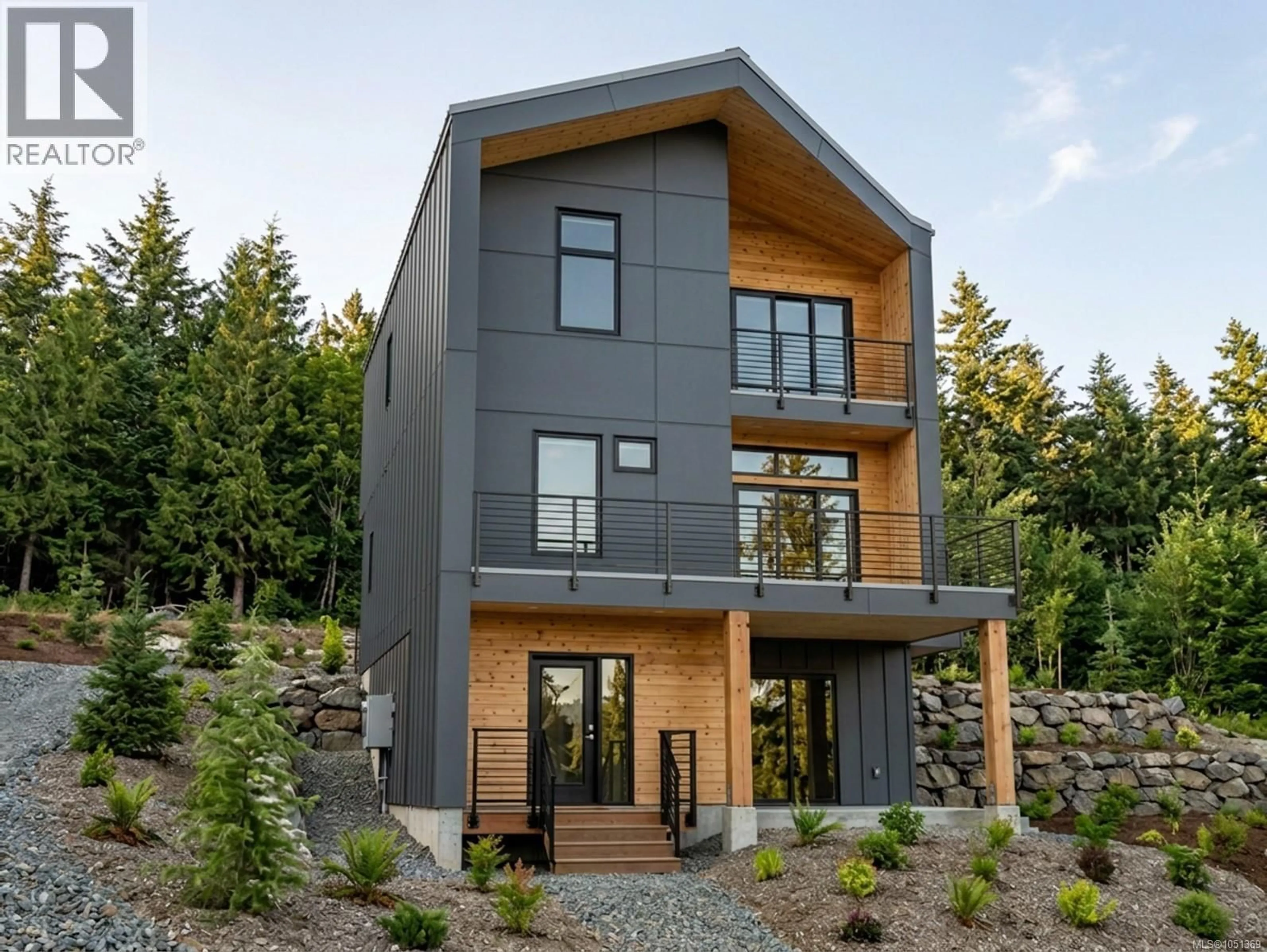 Home with brick exterior material, unknown for 1032 SHORE PINE DRIVE, Ucluelet British Columbia V0R3A0