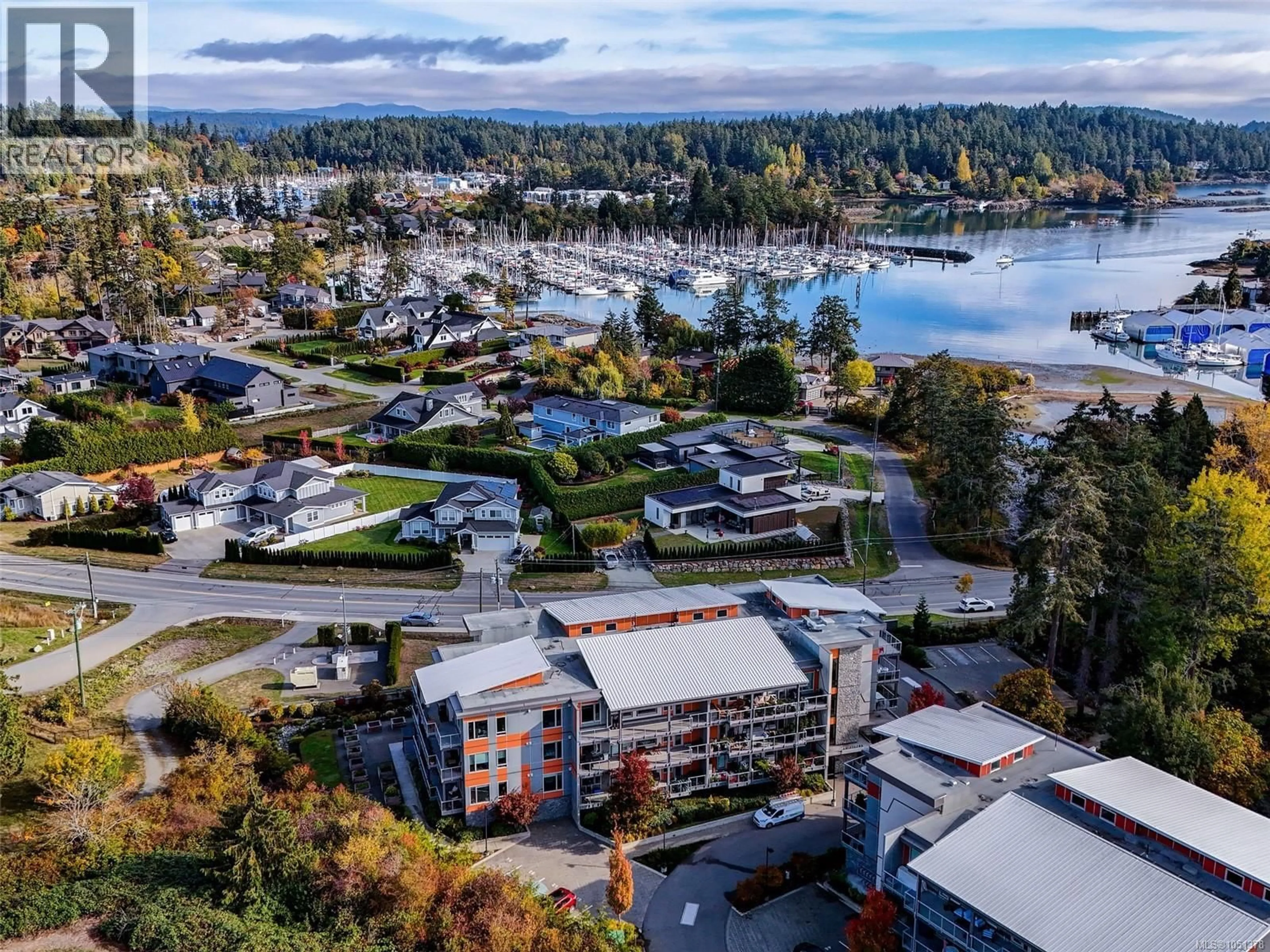 A pic from outside/outdoor area/front of a property/back of a property/a pic from drone, water/lake/river/ocean view for 405 - 10680 MCDONALD PARK ROAD, North Saanich British Columbia V8L5S7