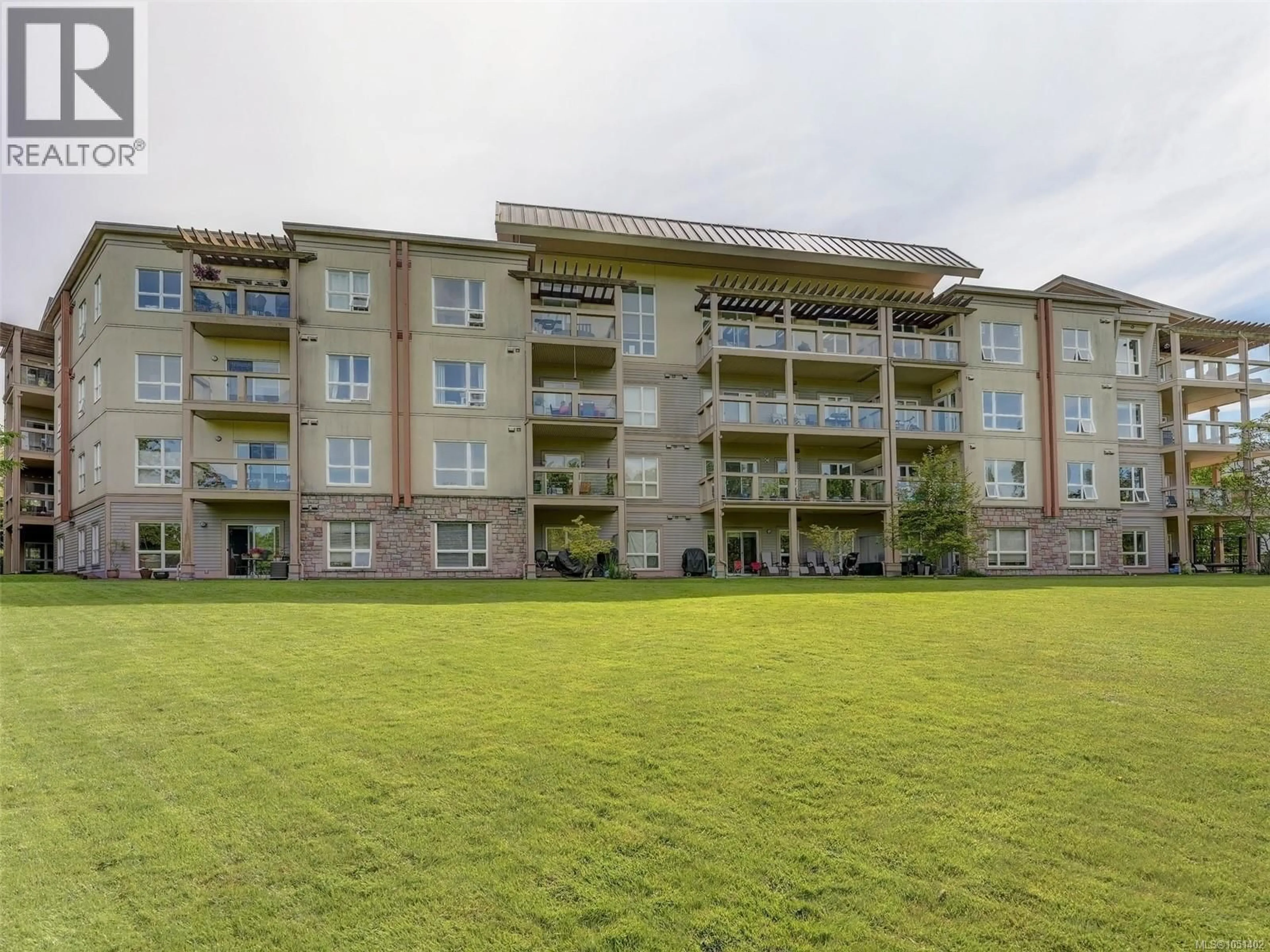 A pic from outside/outdoor area/front of a property/back of a property/a pic from drone, building for 407 - 1156 COLVILLE ROAD, Esquimalt British Columbia V9A4P7