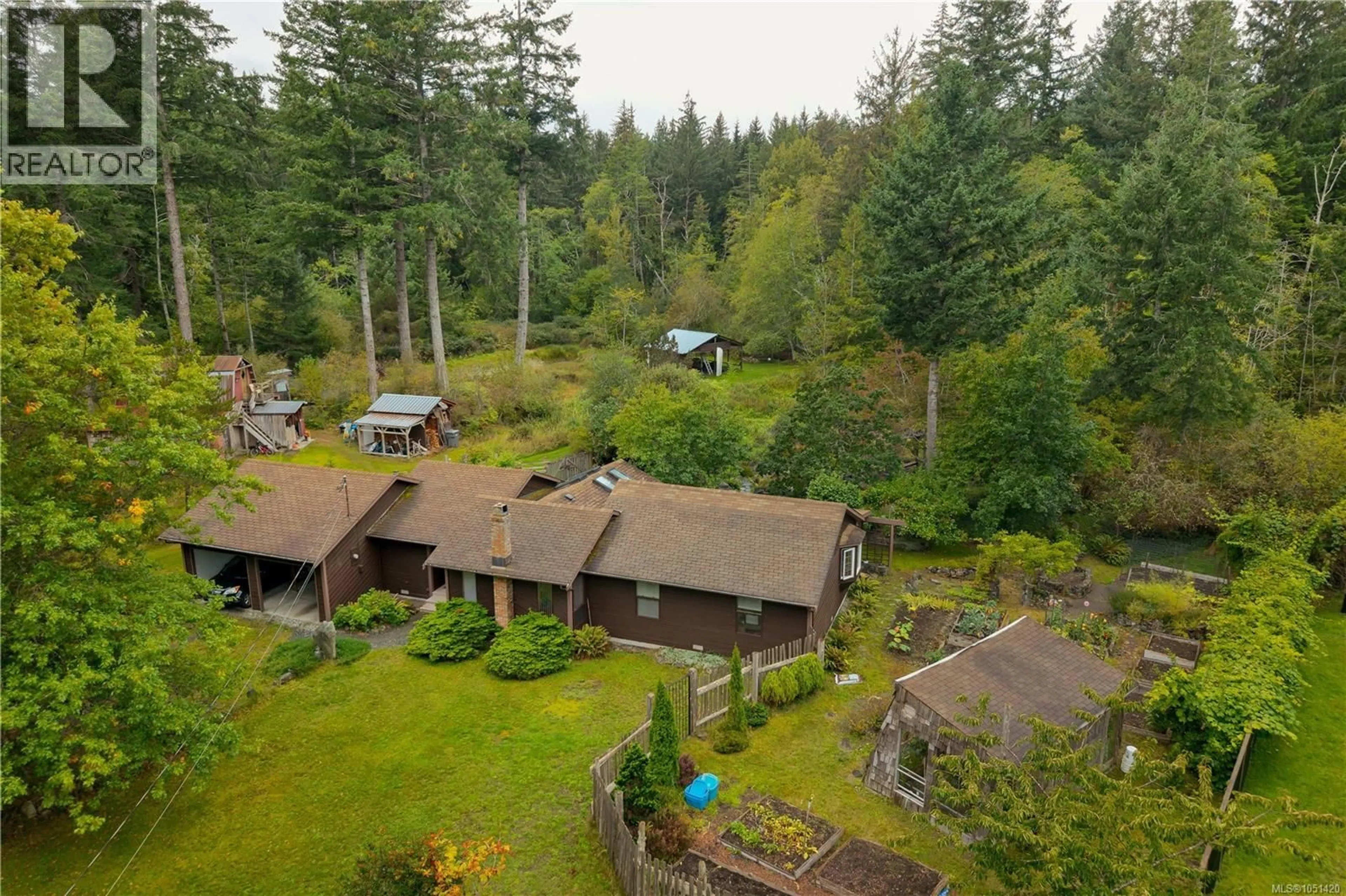 A pic from outside/outdoor area/front of a property/back of a property/a pic from drone, forest/trees view for 665 FOX ROAD, Quadra Island British Columbia V0P1N0