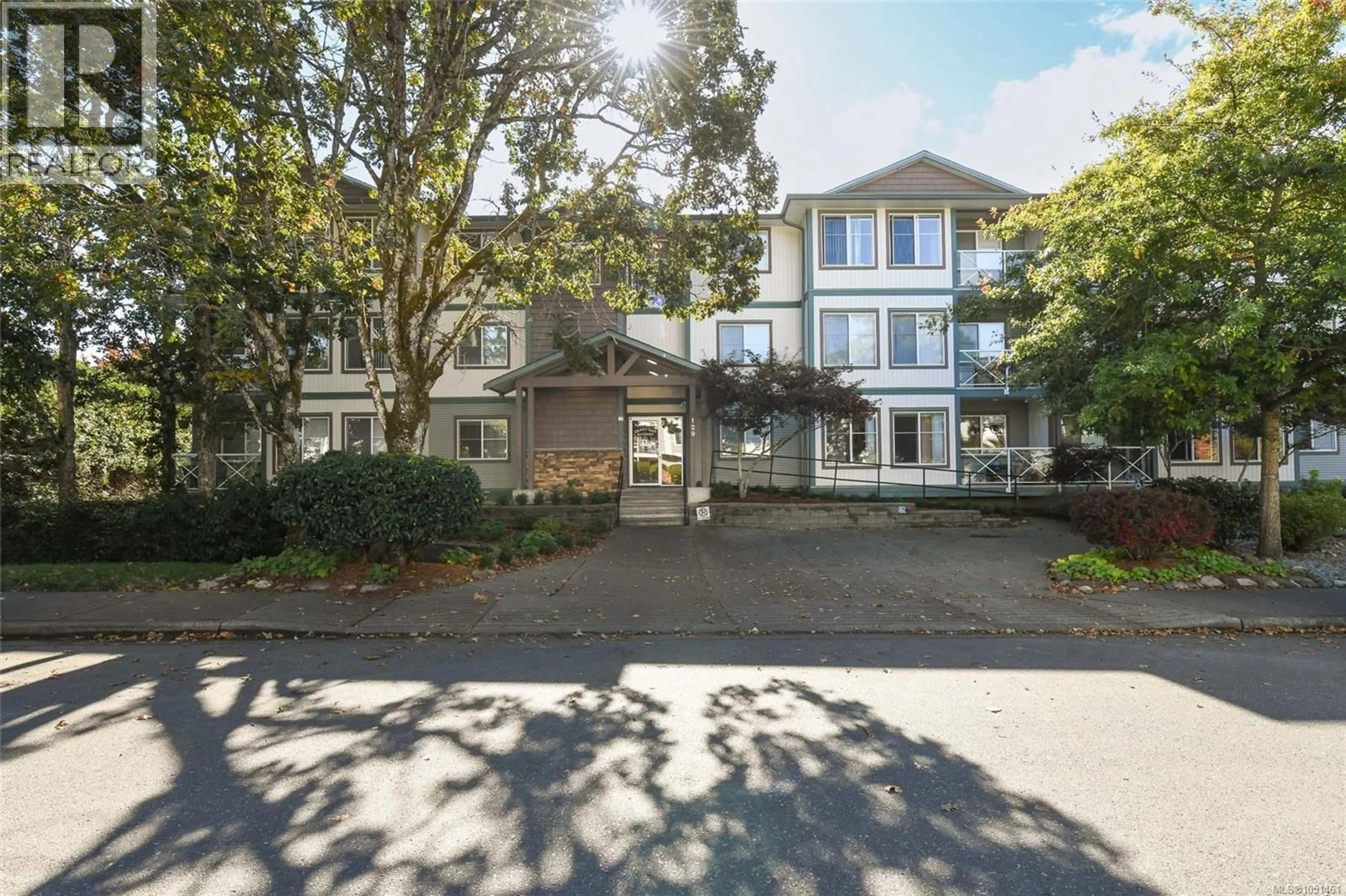 A pic from outside/outdoor area/front of a property/back of a property/a pic from drone, street for 303 - 129 BACK ROAD, Courtenay British Columbia V9N3W5