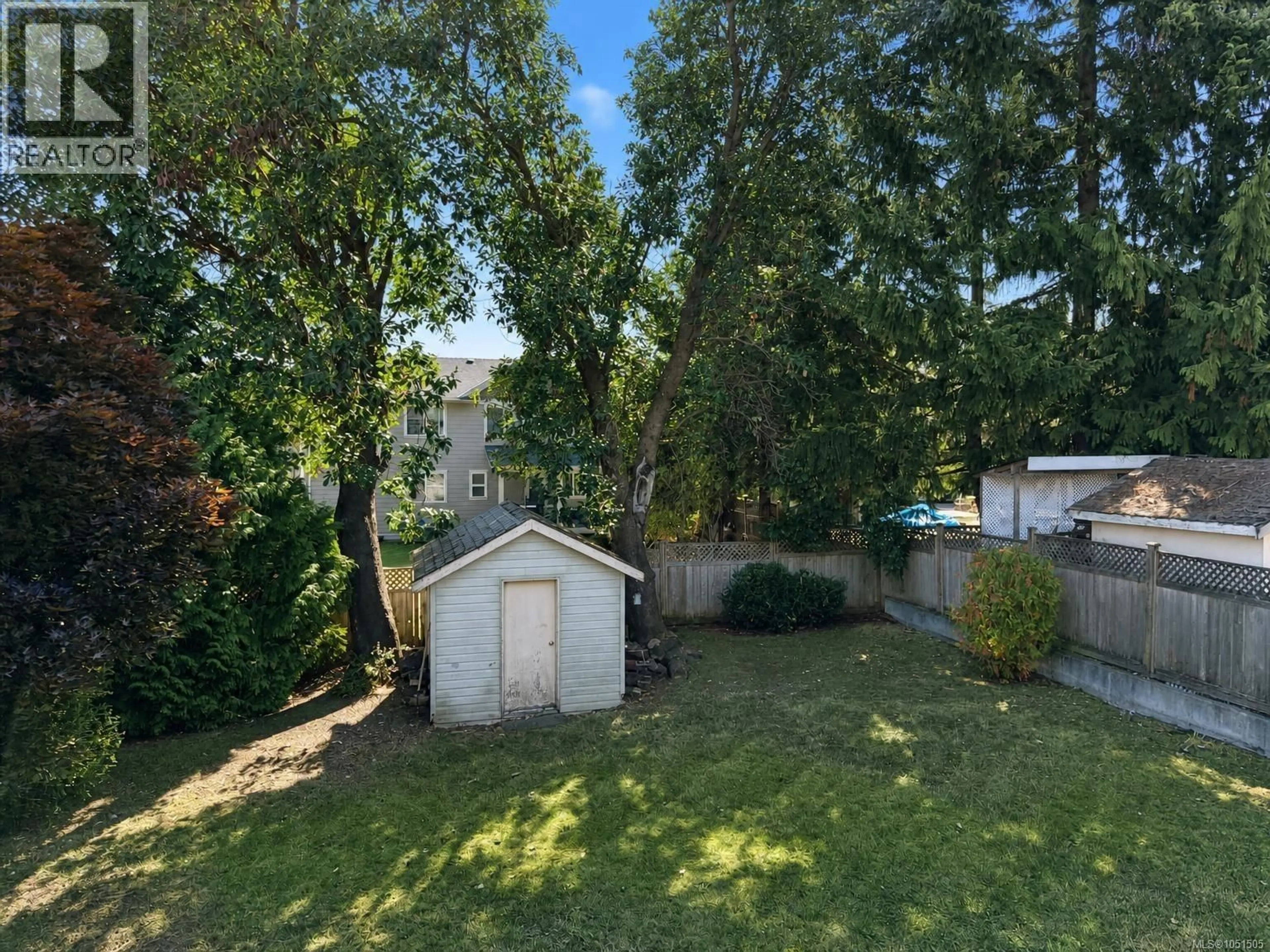 A pic from outside/outdoor area/front of a property/back of a property/a pic from drone, forest/trees view for 6083 SIERRA WAY, Nanaimo British Columbia V9V1R8
