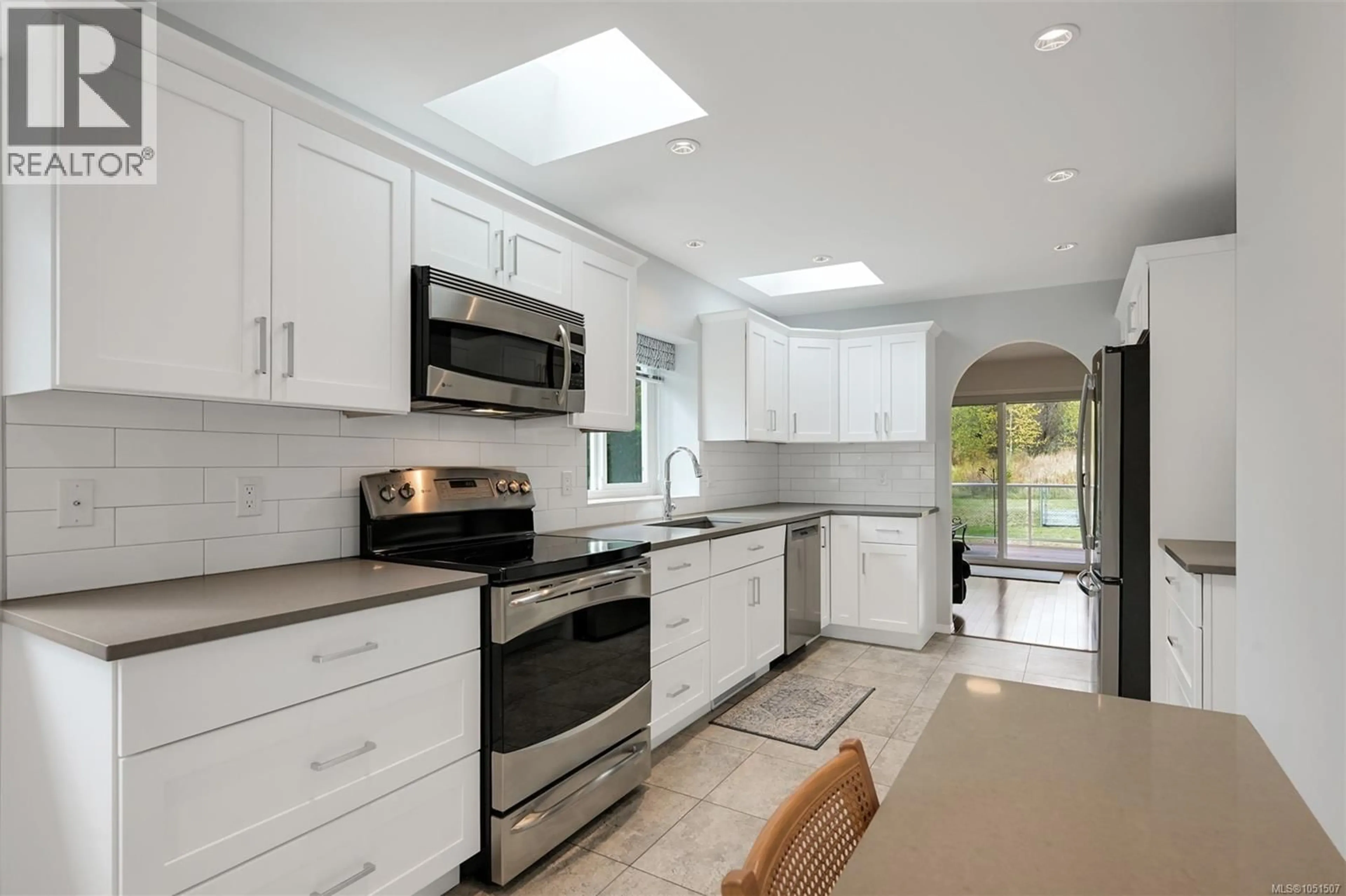 Contemporary kitchen, ceramic/tile floor for 1309 LAYRITZ PLACE, Saanich British Columbia V8Z7C4