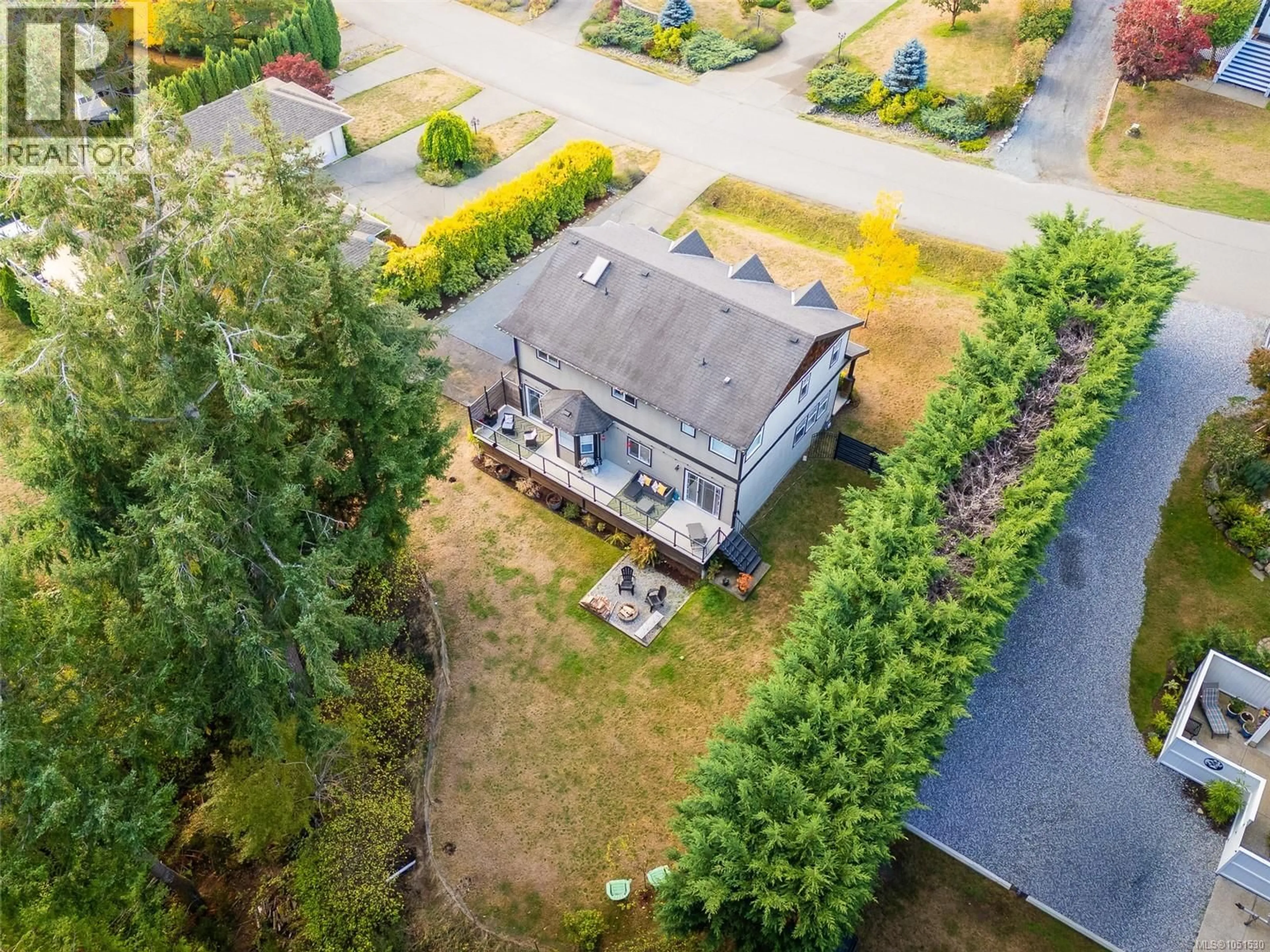 A pic from outside/outdoor area/front of a property/back of a property/a pic from drone, street for 2125 WILDFLOWER ROAD, Shawnigan Lake British Columbia V0R2W1
