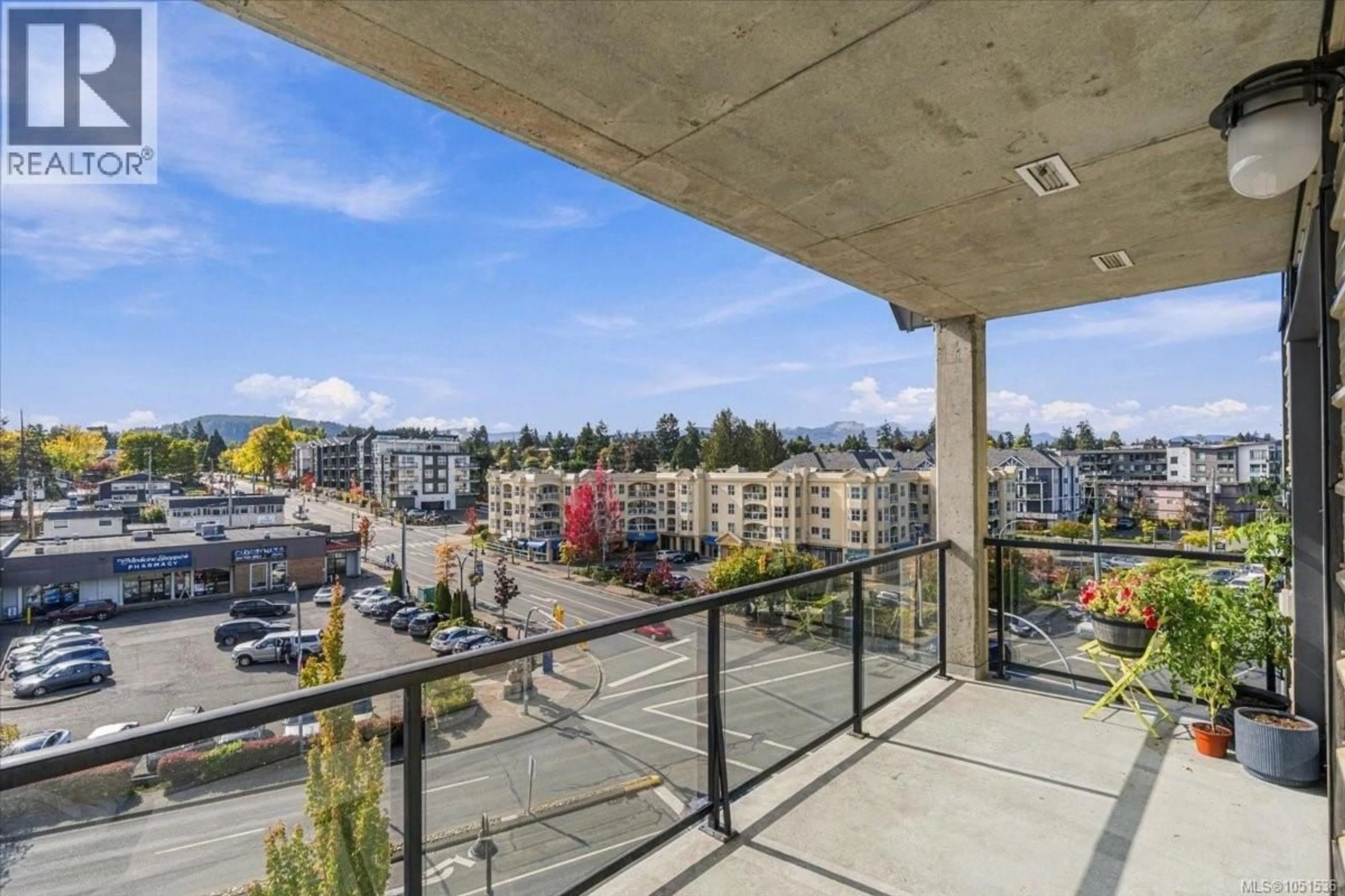 Patio, city buildings view from balcony for 606 - 194 BEACHSIDE DRIVE, Parksville British Columbia V9P0B1