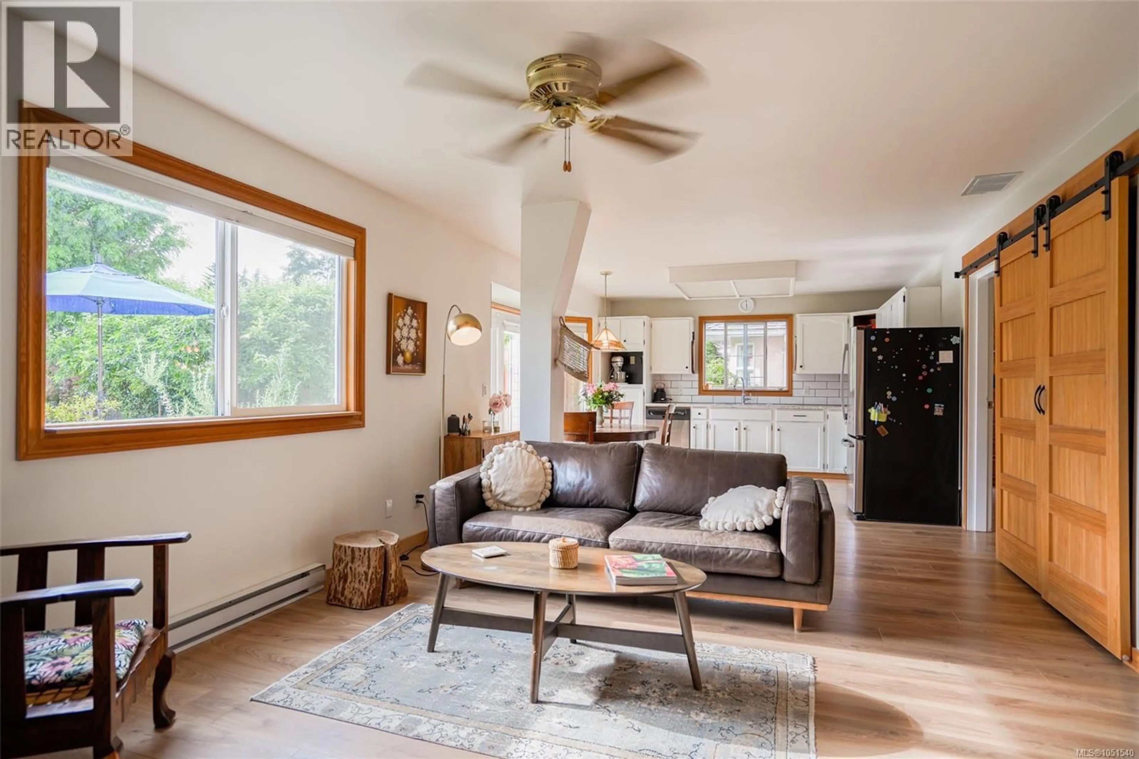 Living room with furniture, wood/laminate floor for 5550 CHERRY CREEK ROAD, Port Alberni British Columbia V9Y7Z2