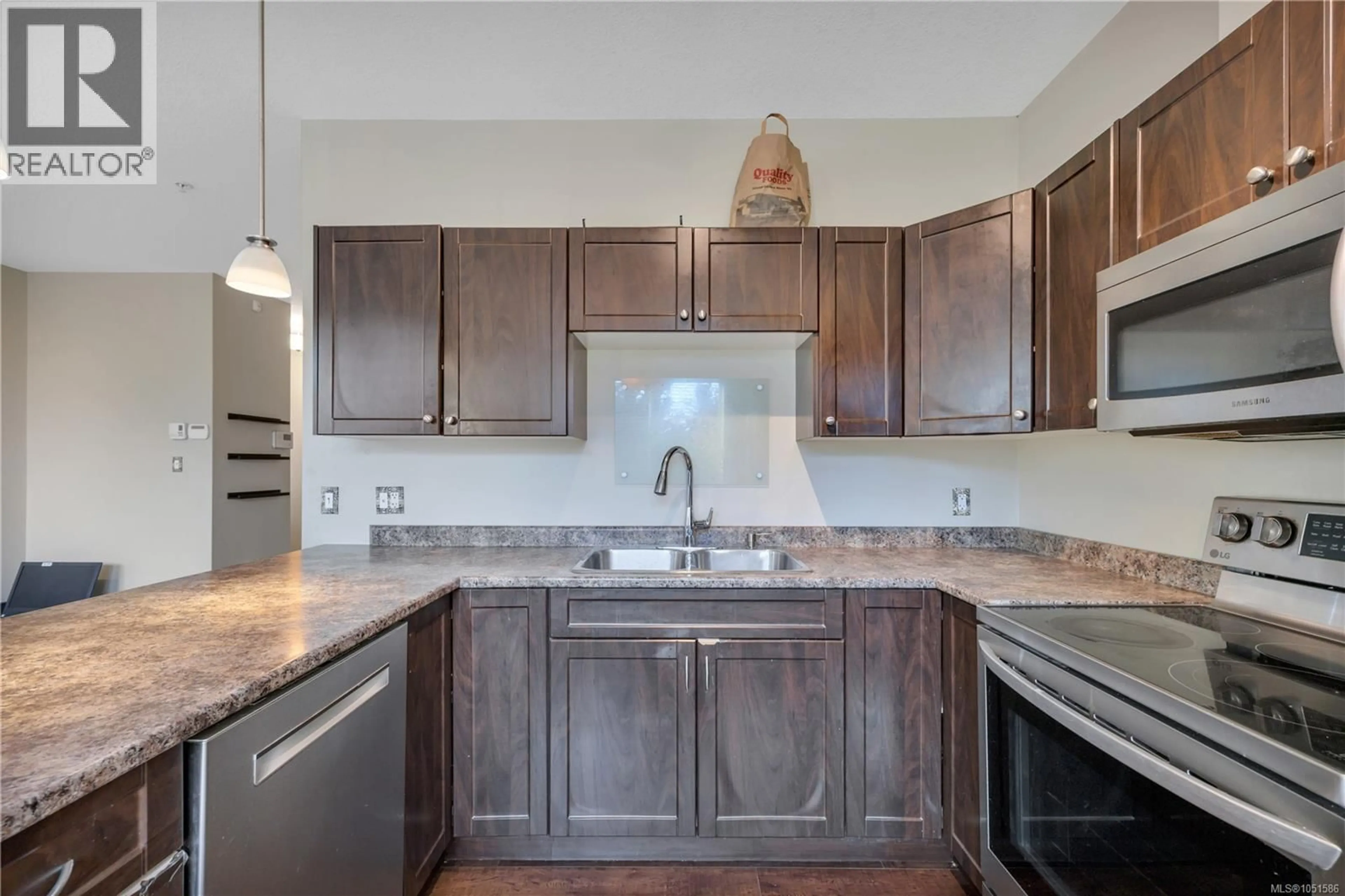 Standard kitchen, ceramic/tile floor for 103 - 2157 RIDGEMONT PLACE, Nanaimo British Columbia V9T0C8
