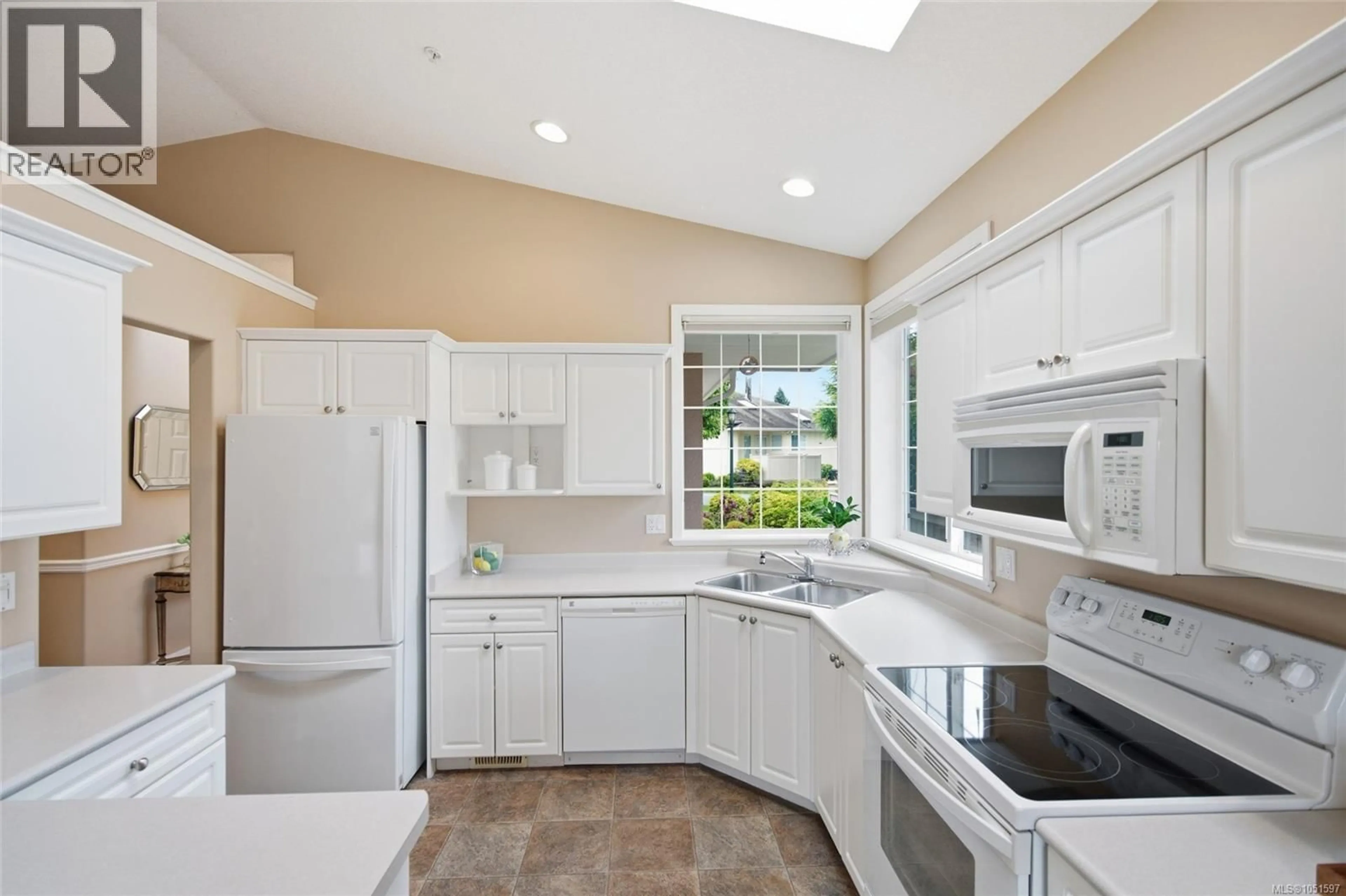 Open concept kitchen, ceramic/tile floor for 6154 SATURNA AVENUE, Nanaimo British Columbia V9V1S8