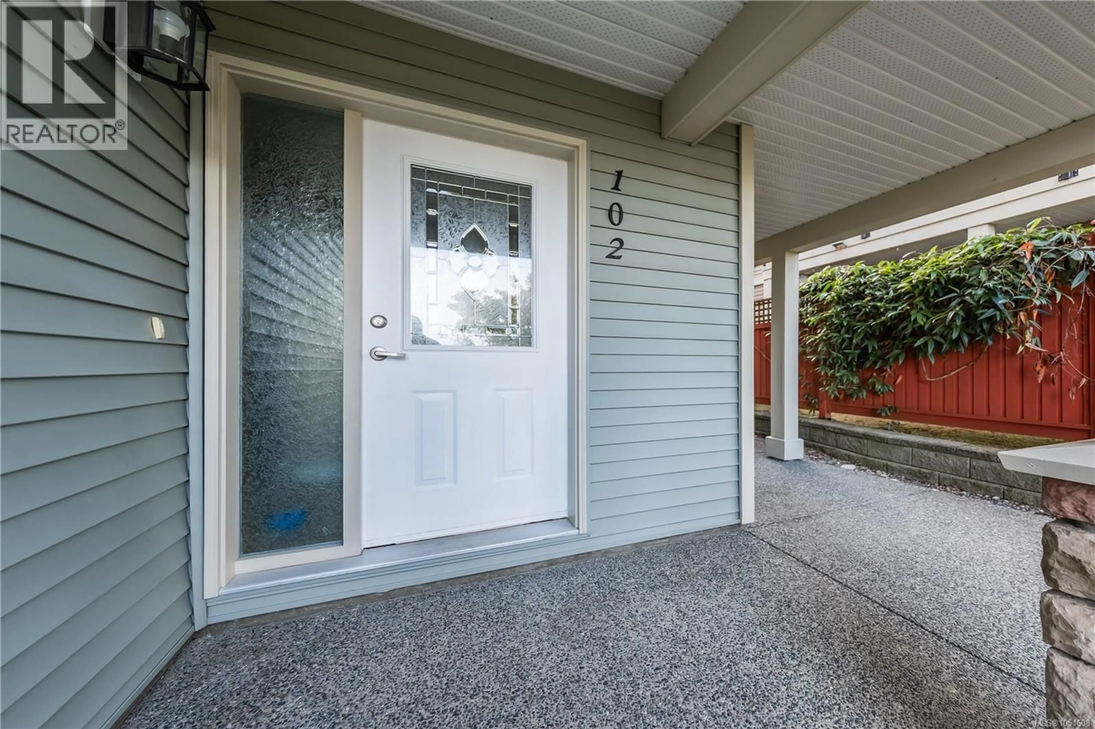 Home with vinyl exterior material, street for 102 - 6149 WASHINGTON WAY, Nanaimo British Columbia V9T0A2