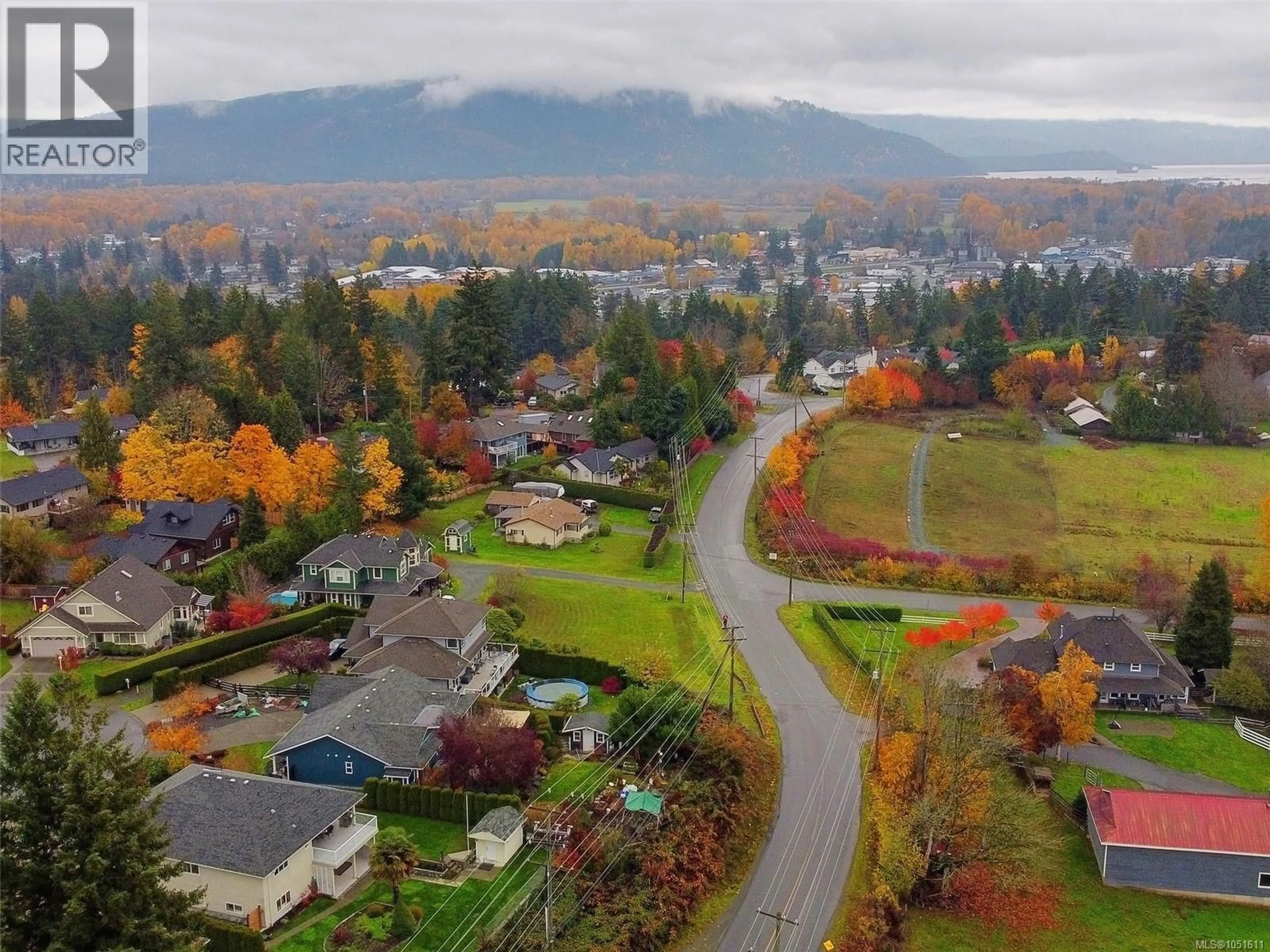 A pic from outside/outdoor area/front of a property/back of a property/a pic from drone, mountain view for 1867 DEBORAH DRIVE, Duncan British Columbia V9L5A5