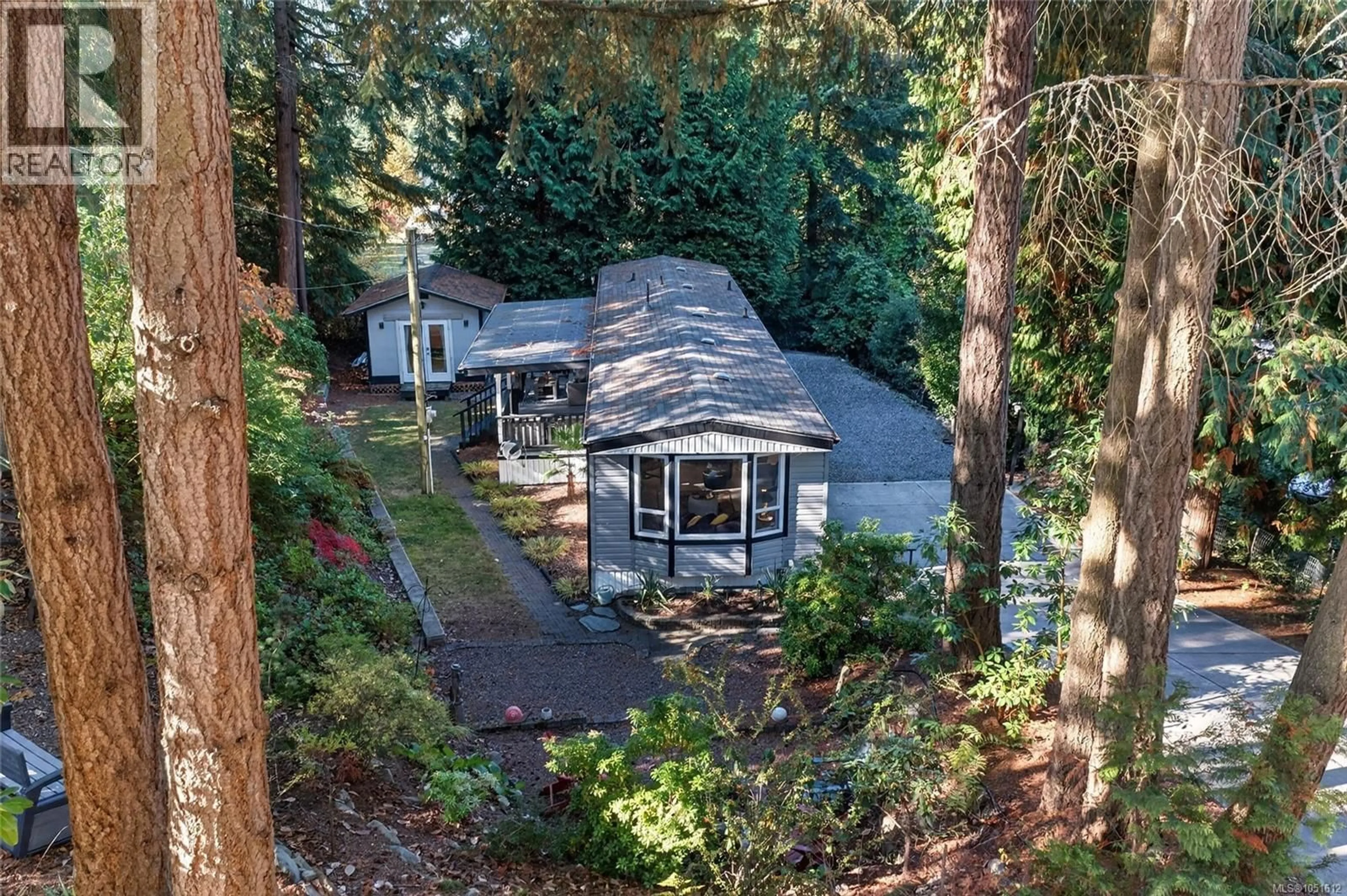 A pic from outside/outdoor area/front of a property/back of a property/a pic from drone, forest/trees view for 6071 PINE RIDGE CRESCENT, Nanaimo British Columbia V9T2N8