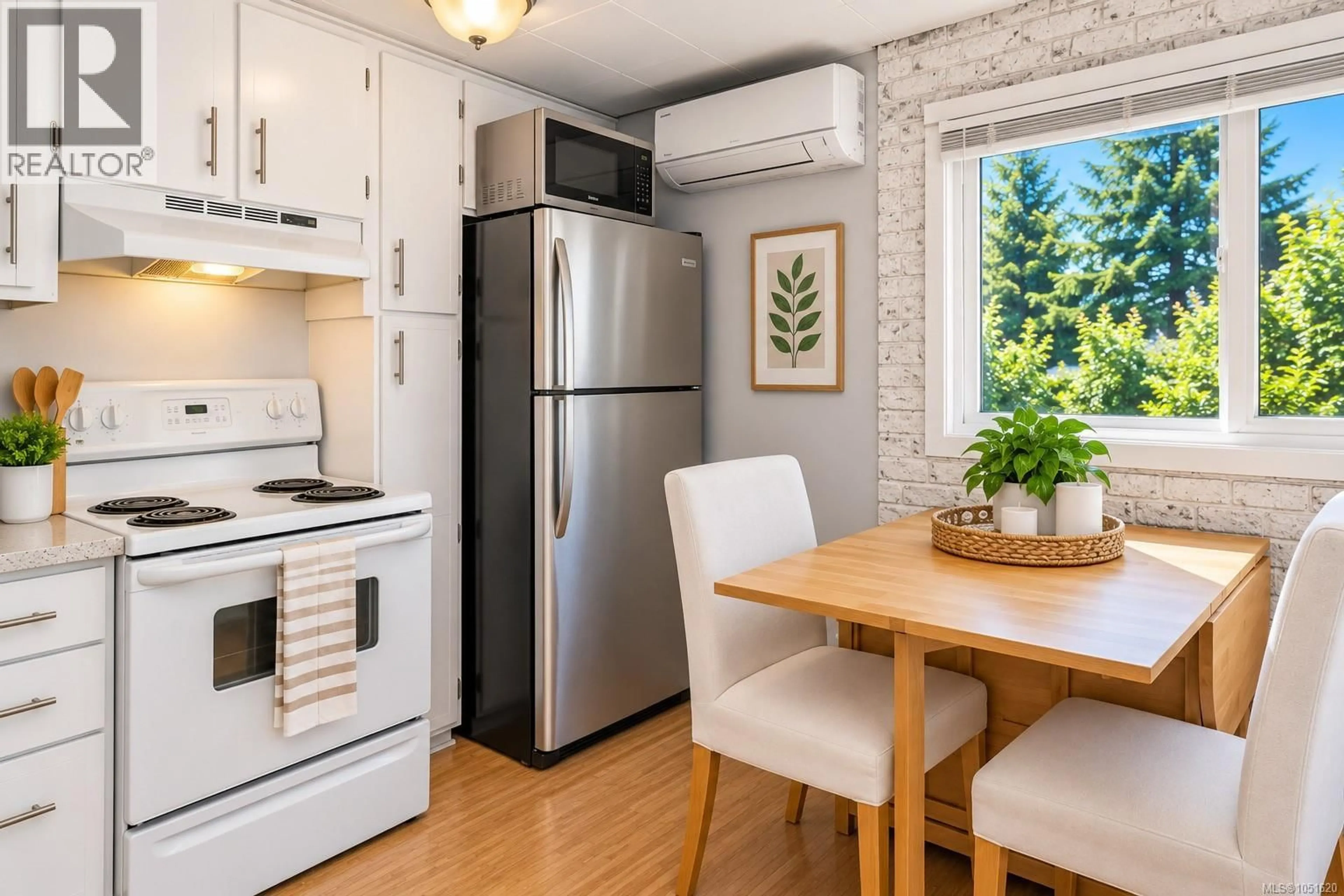 Open concept kitchen, wood/laminate floor for 13 - 5838 BLYTHWOOD ROAD, Sooke British Columbia V9Z1H7