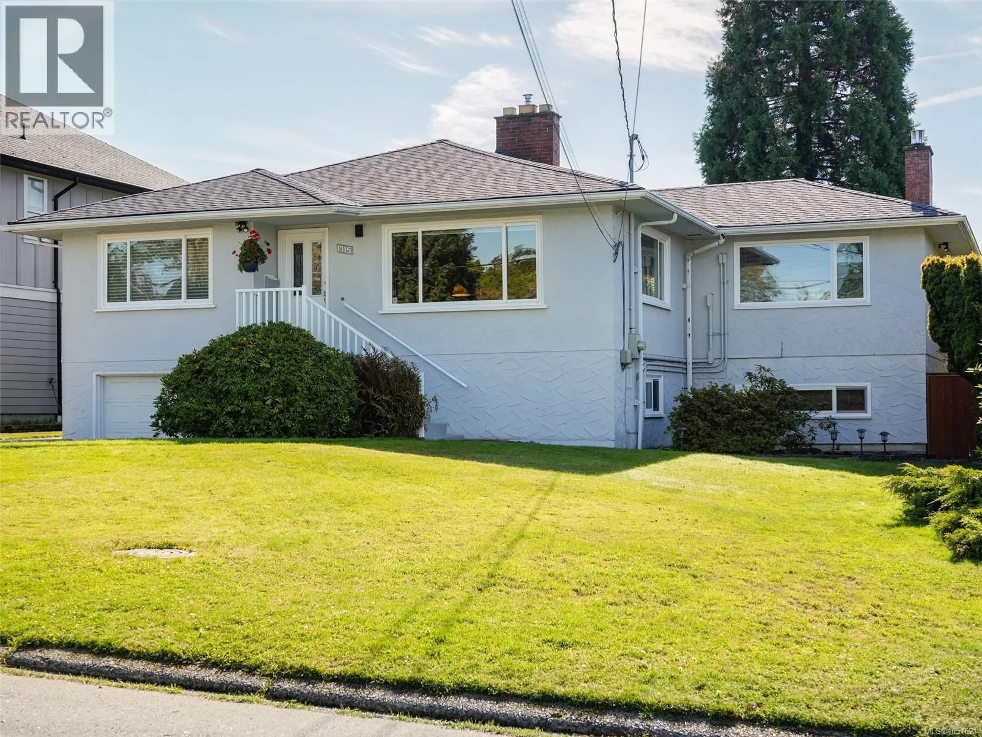 Home with vinyl exterior material, street for 1715 CEDAR AVENUE, Saanich British Columbia V8P1X1