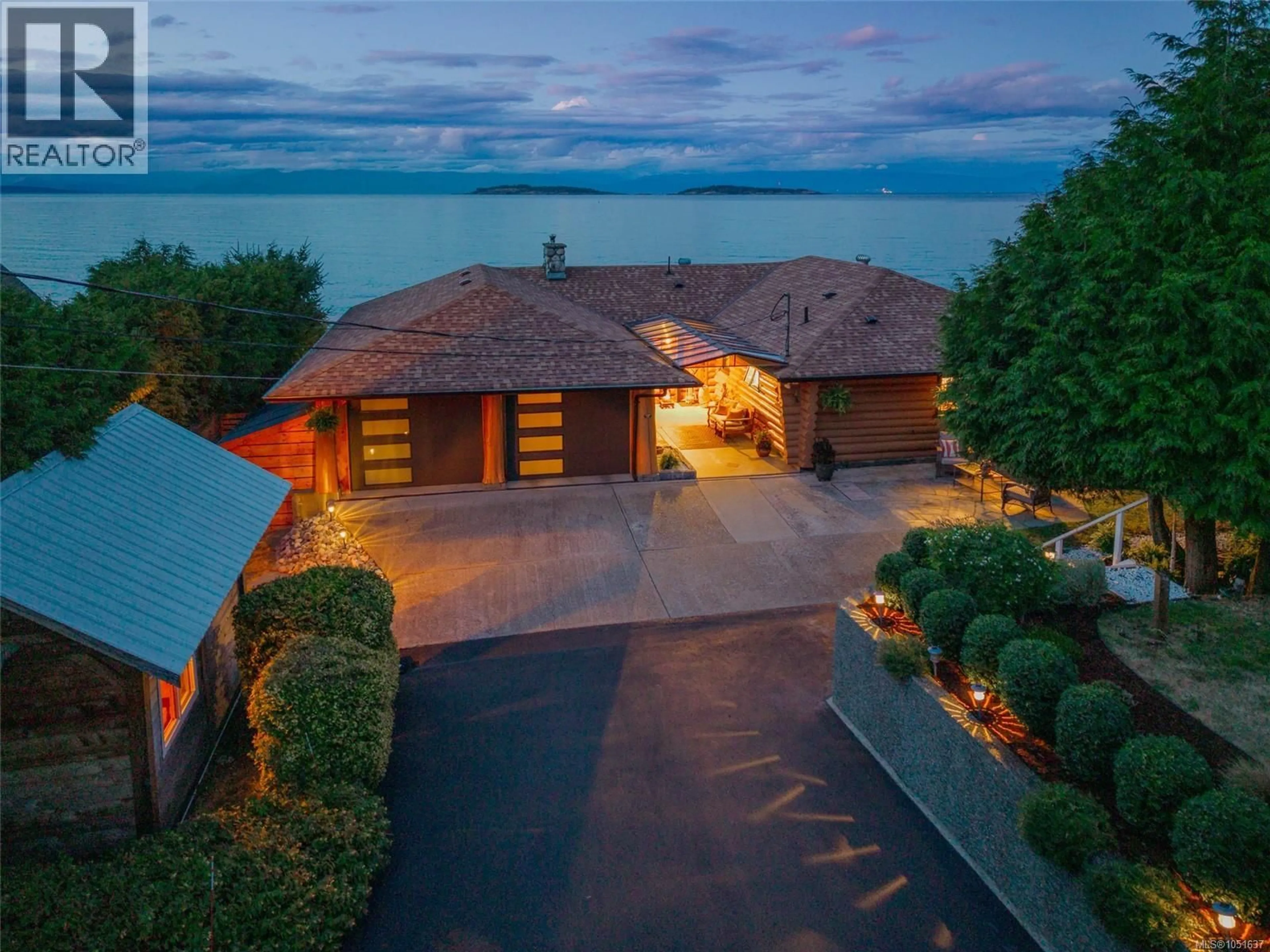 A pic from outside/outdoor area/front of a property/back of a property/a pic from drone, water/lake/river/ocean view for 1388 REEF ROAD, Nanoose Bay British Columbia V9P9B9