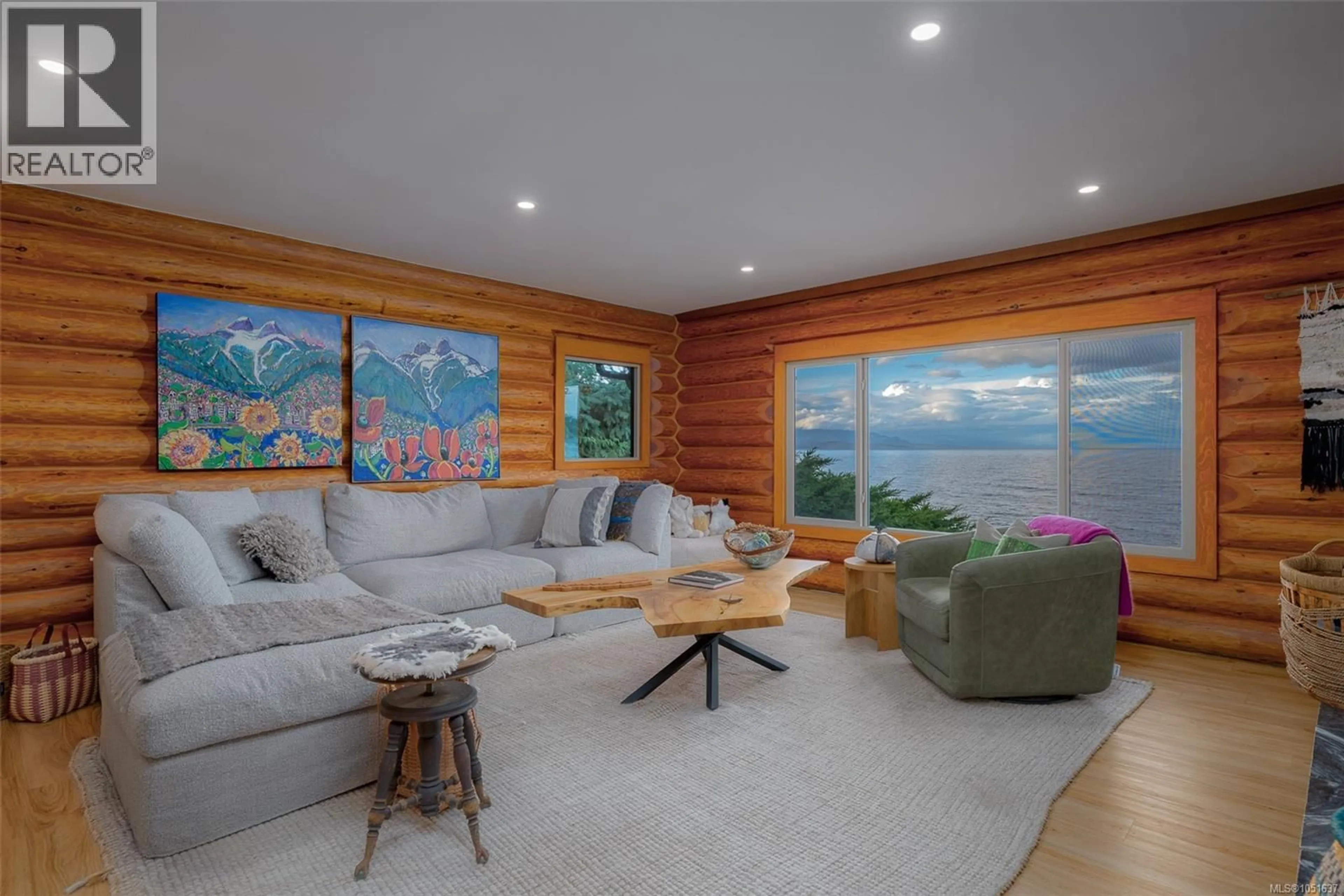 Living room with furniture, wood/laminate floor for 1388 REEF ROAD, Nanoose Bay British Columbia V9P9B9