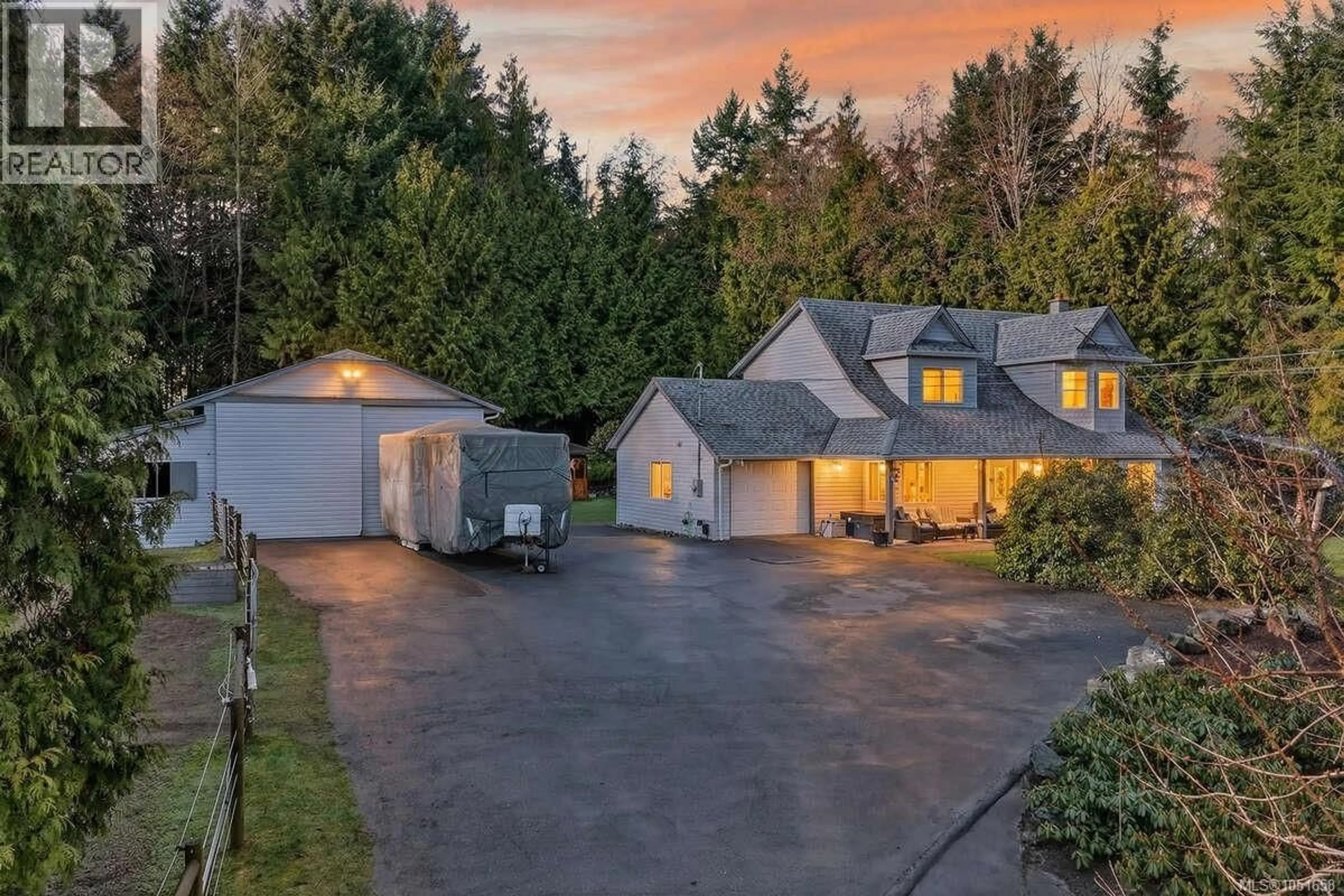 A pic from outside/outdoor area/front of a property/back of a property/a pic from drone, street for 1136 CORCAN ROAD, Qualicum Beach British Columbia V9K2R6