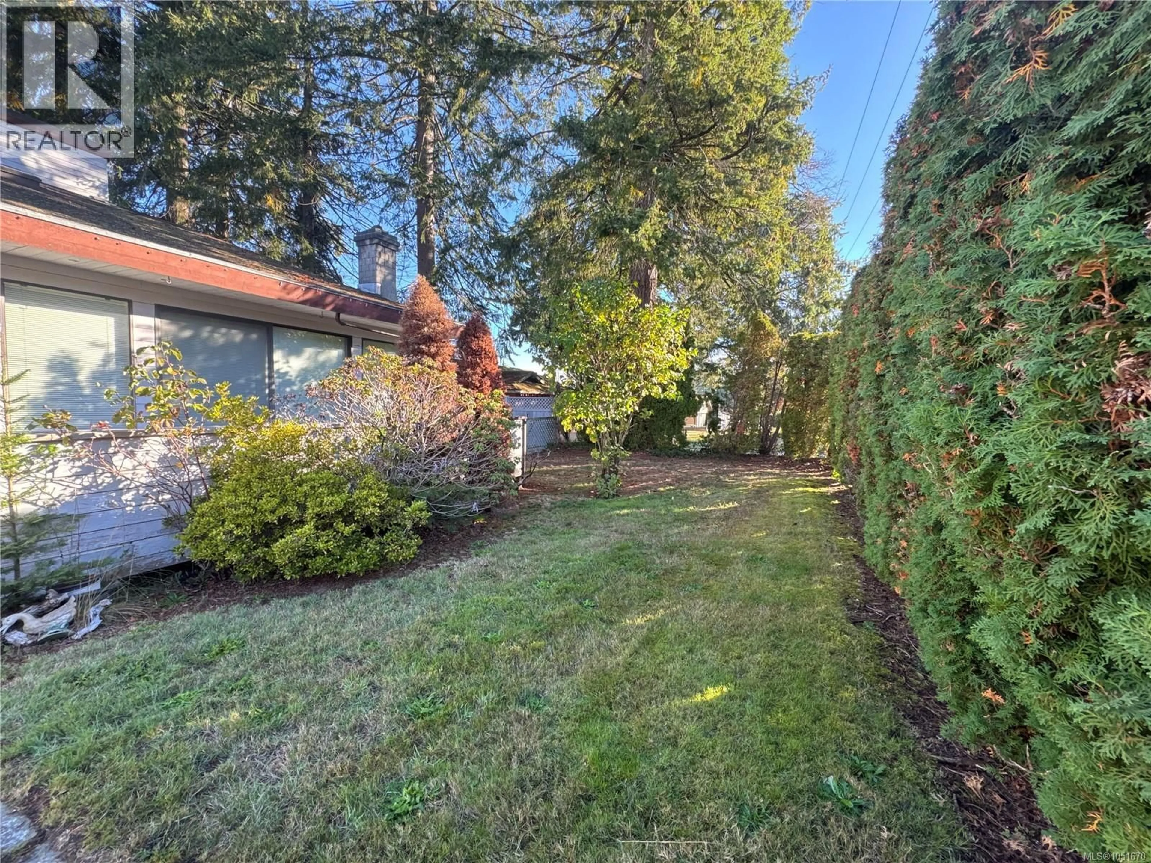 A pic from outside/outdoor area/front of a property/back of a property/a pic from drone, forest/trees view for 632 ERICKSON ROAD, Campbell River British Columbia V9W5N9