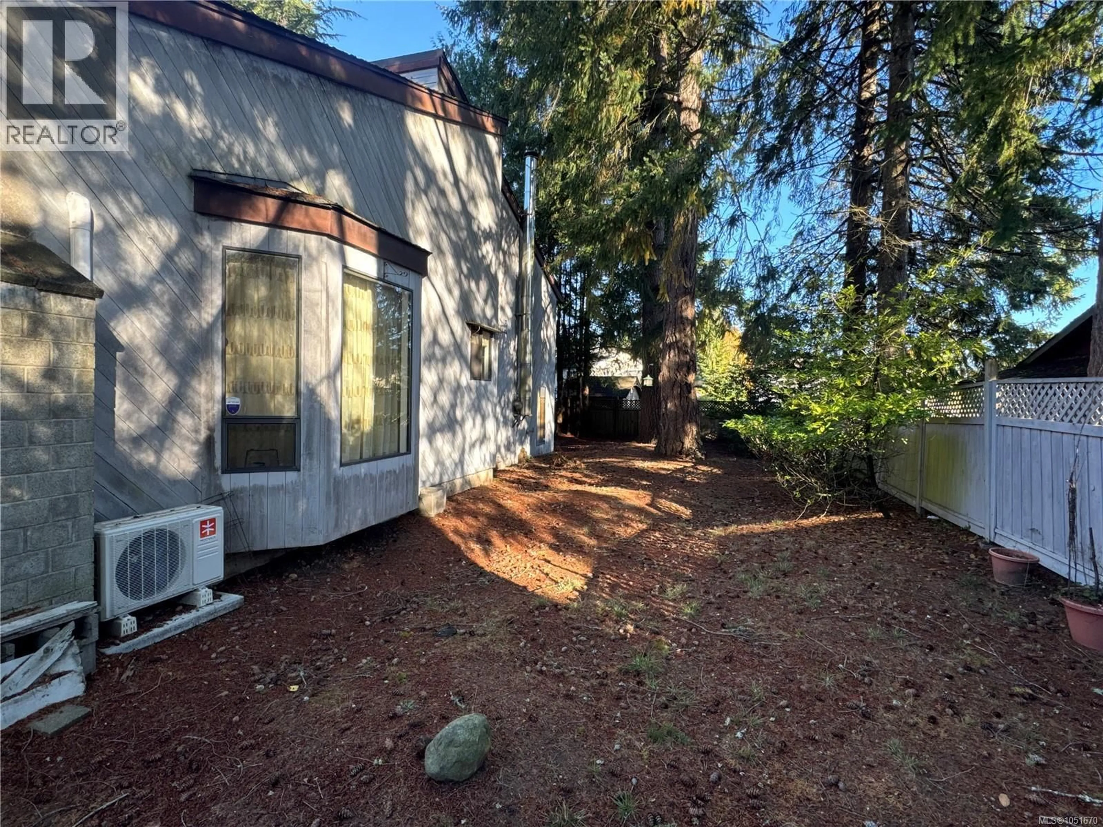 A pic from outside/outdoor area/front of a property/back of a property/a pic from drone, forest/trees view for 632 ERICKSON ROAD, Campbell River British Columbia V9W5N9