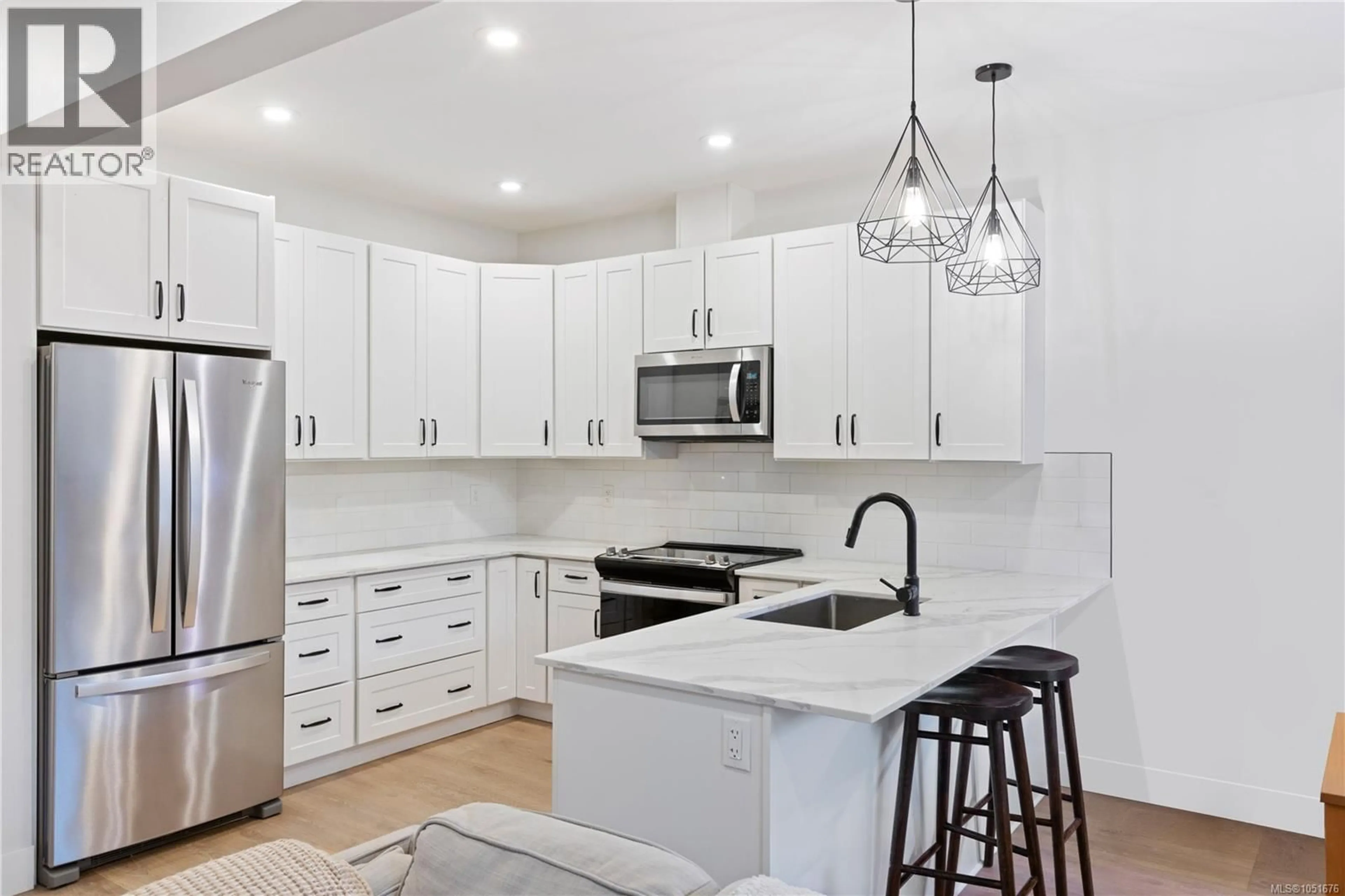 Open concept kitchen, ceramic/tile floor for 2153 BANFORD PLACE, Sooke British Columbia V9Z0W6