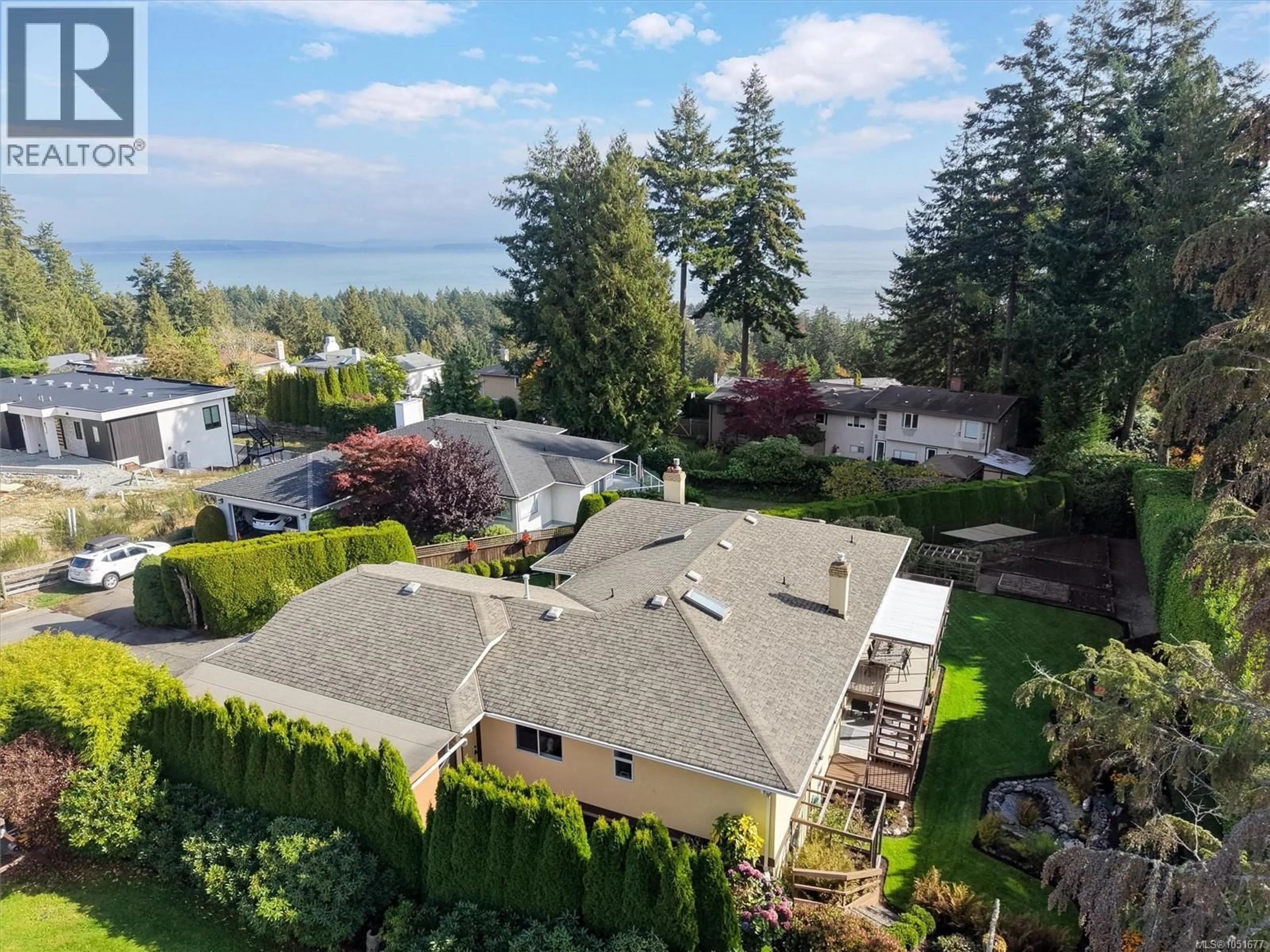 A pic from outside/outdoor area/front of a property/back of a property/a pic from drone, water/lake/river/ocean view for 5179 DEL MONTE AVENUE, Saanich British Columbia V8Y1X3