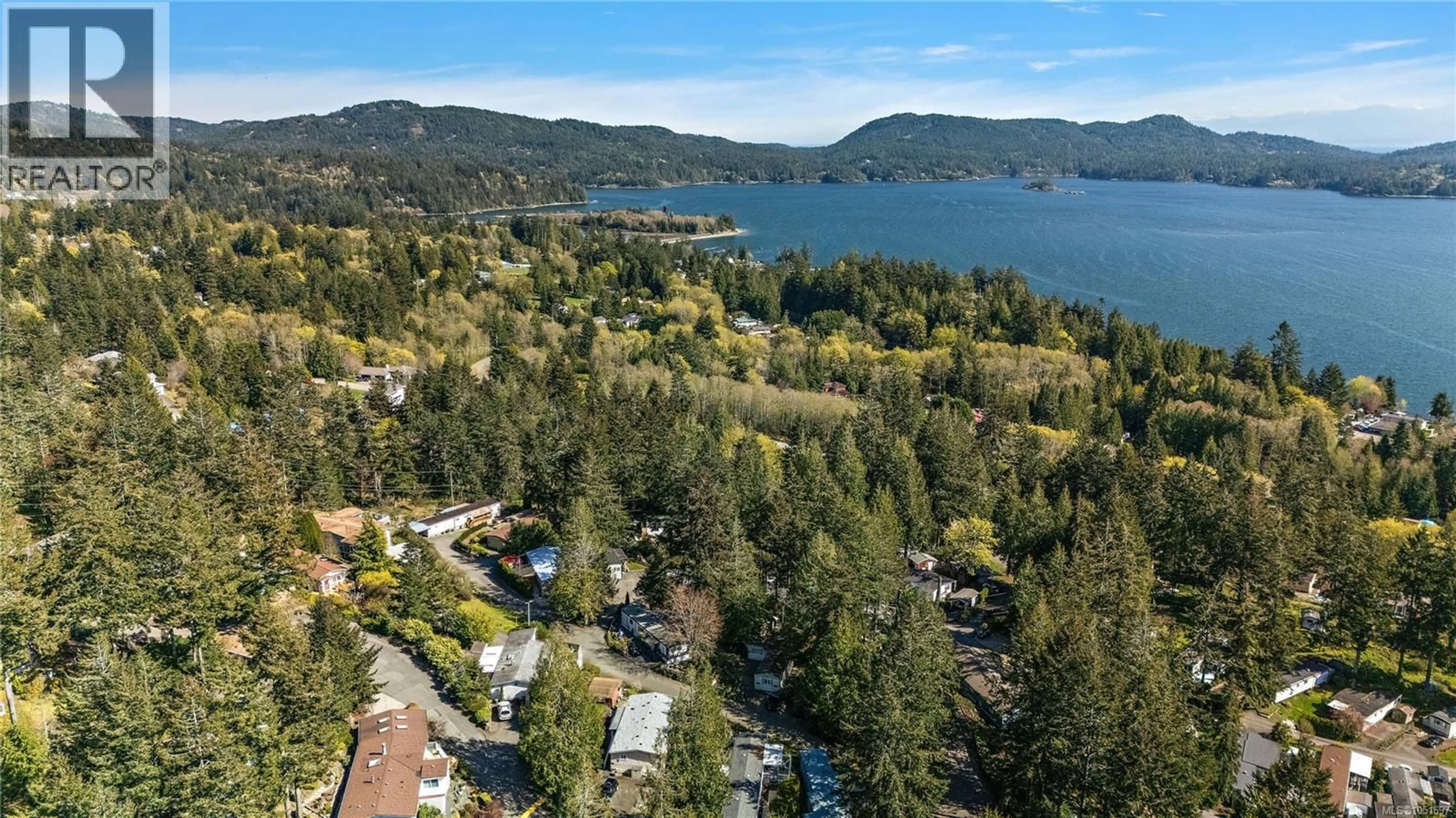 A pic from outside/outdoor area/front of a property/back of a property/a pic from drone, water/lake/river/ocean view for 73 - 5838 BLYTHWOOD ROAD, Sooke British Columbia V9Z0G2