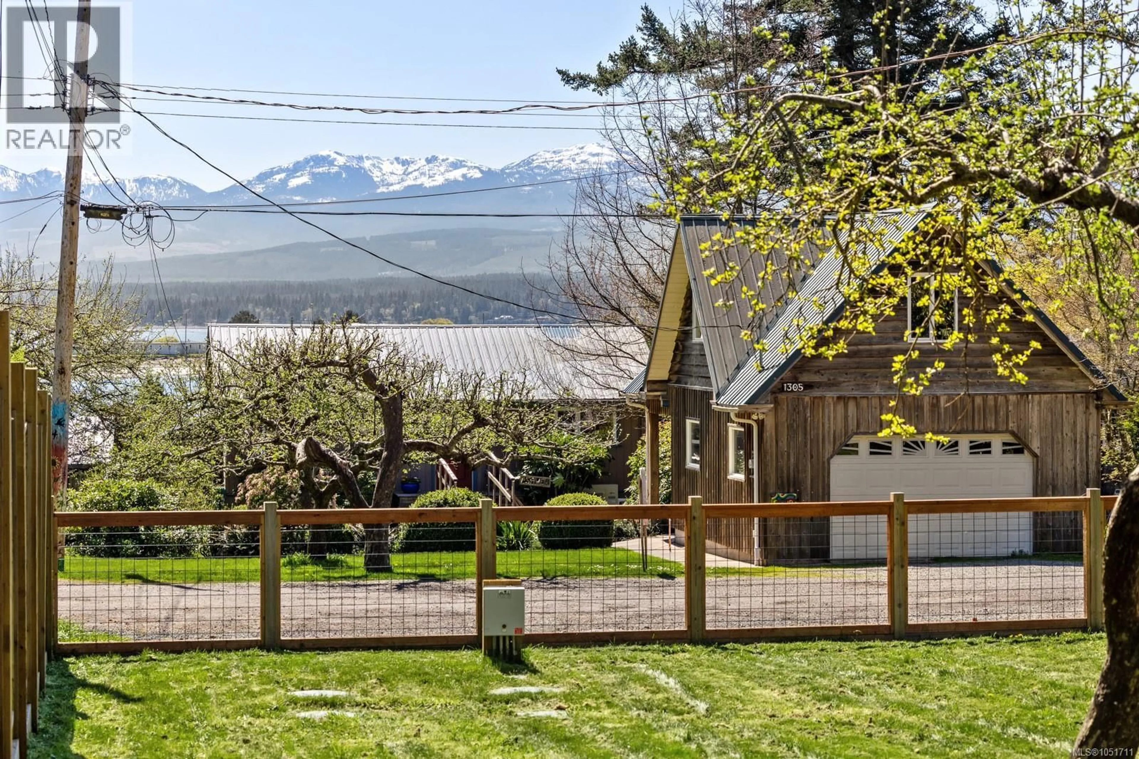 A pic from outside/outdoor area/front of a property/back of a property/a pic from drone, mountain view for 1304 MIDDEN ROAD, Comox British Columbia V9M2R6