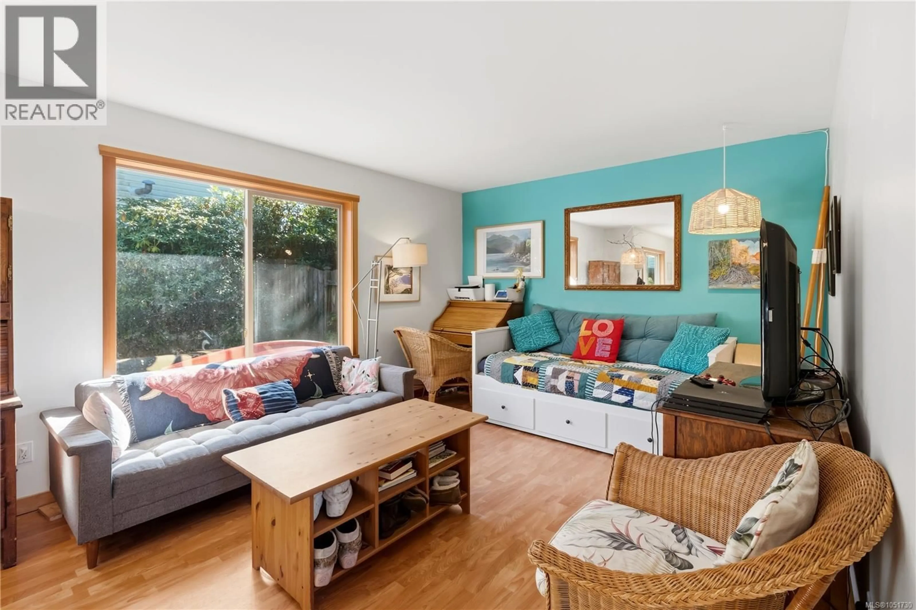 Living room with furniture, wood/laminate floor for 3 - 1626 HOLLY CRESCENT, Ucluelet British Columbia V0R3A0