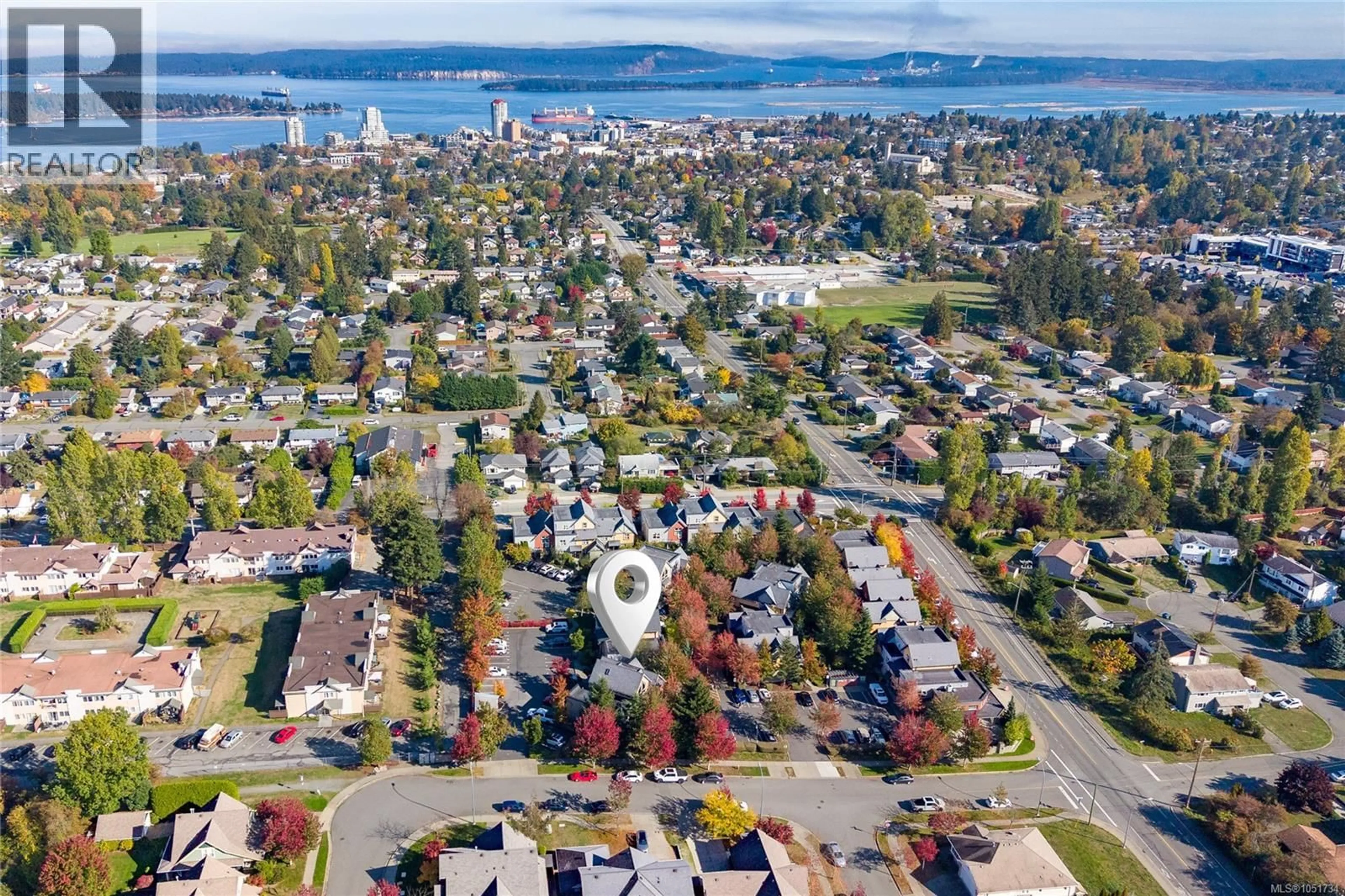 A pic from outside/outdoor area/front of a property/back of a property/a pic from drone, water/lake/river/ocean view for 76 - 1406 JINGLE POT ROAD, Nanaimo British Columbia V9R0A9