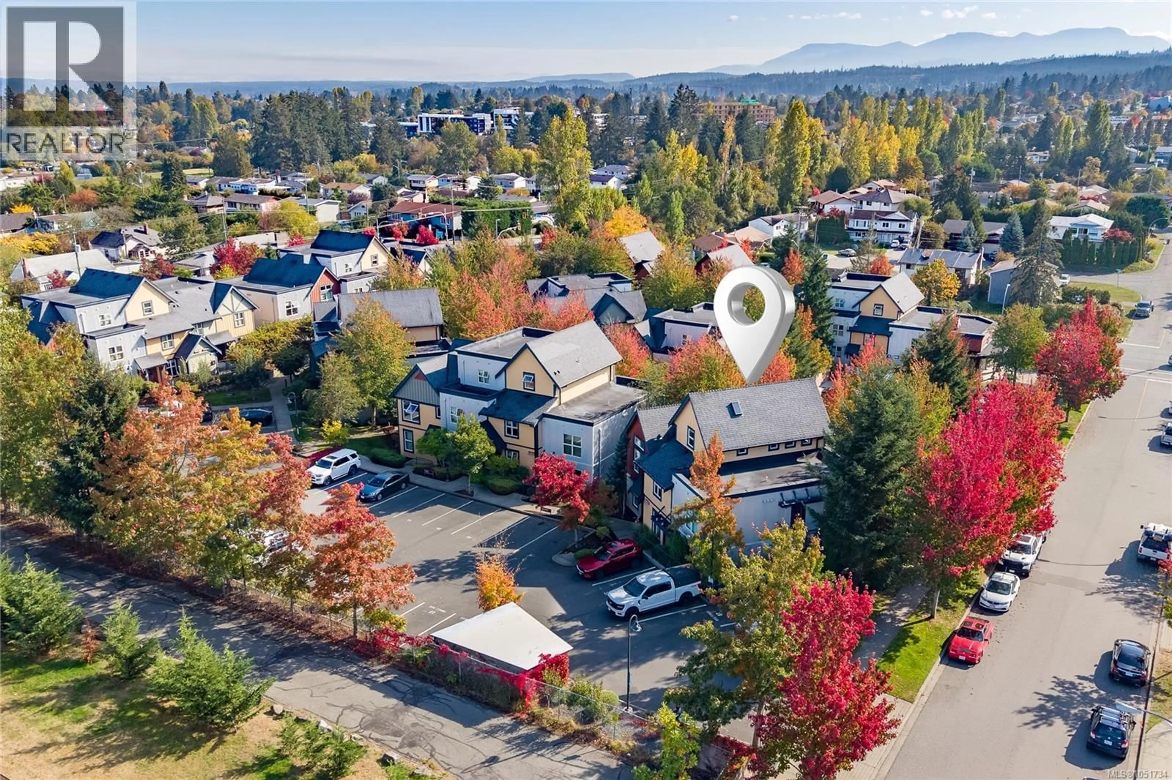 A pic from outside/outdoor area/front of a property/back of a property/a pic from drone, mountain view for 76 - 1406 JINGLE POT ROAD, Nanaimo British Columbia V9R0A9