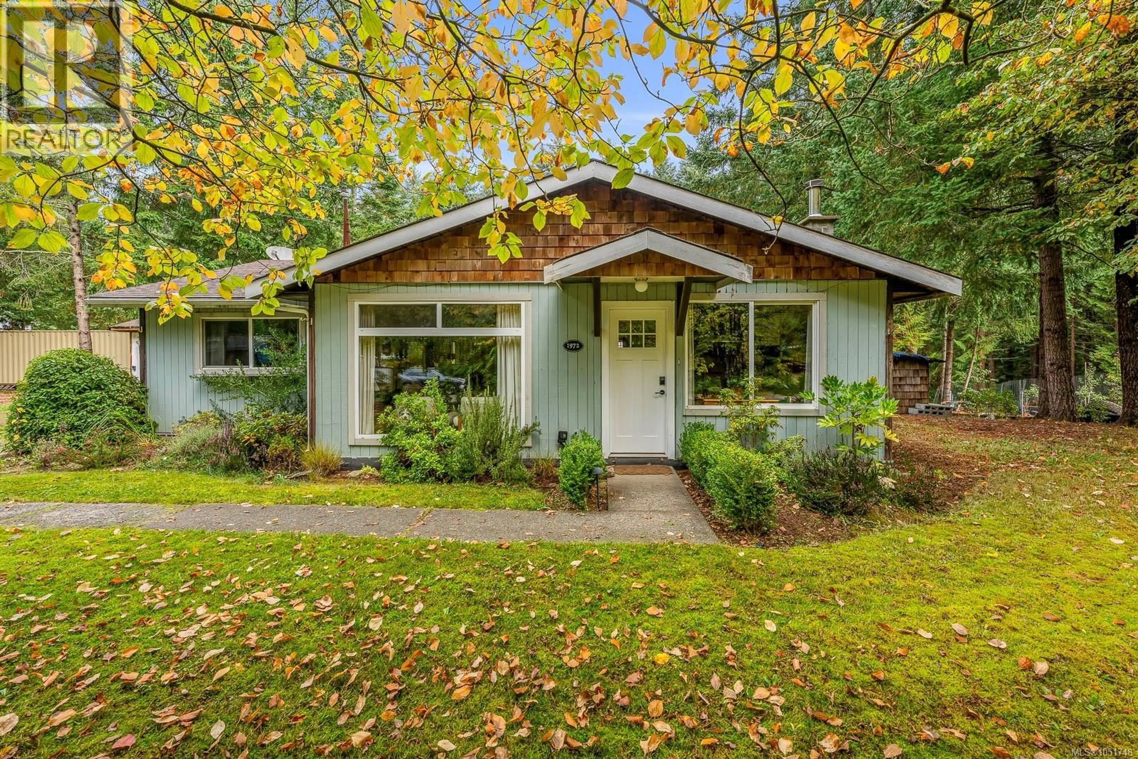 Home with vinyl exterior material, street for 1972 GREENWOOD CRESCENT, Comox British Columbia V9M4B1