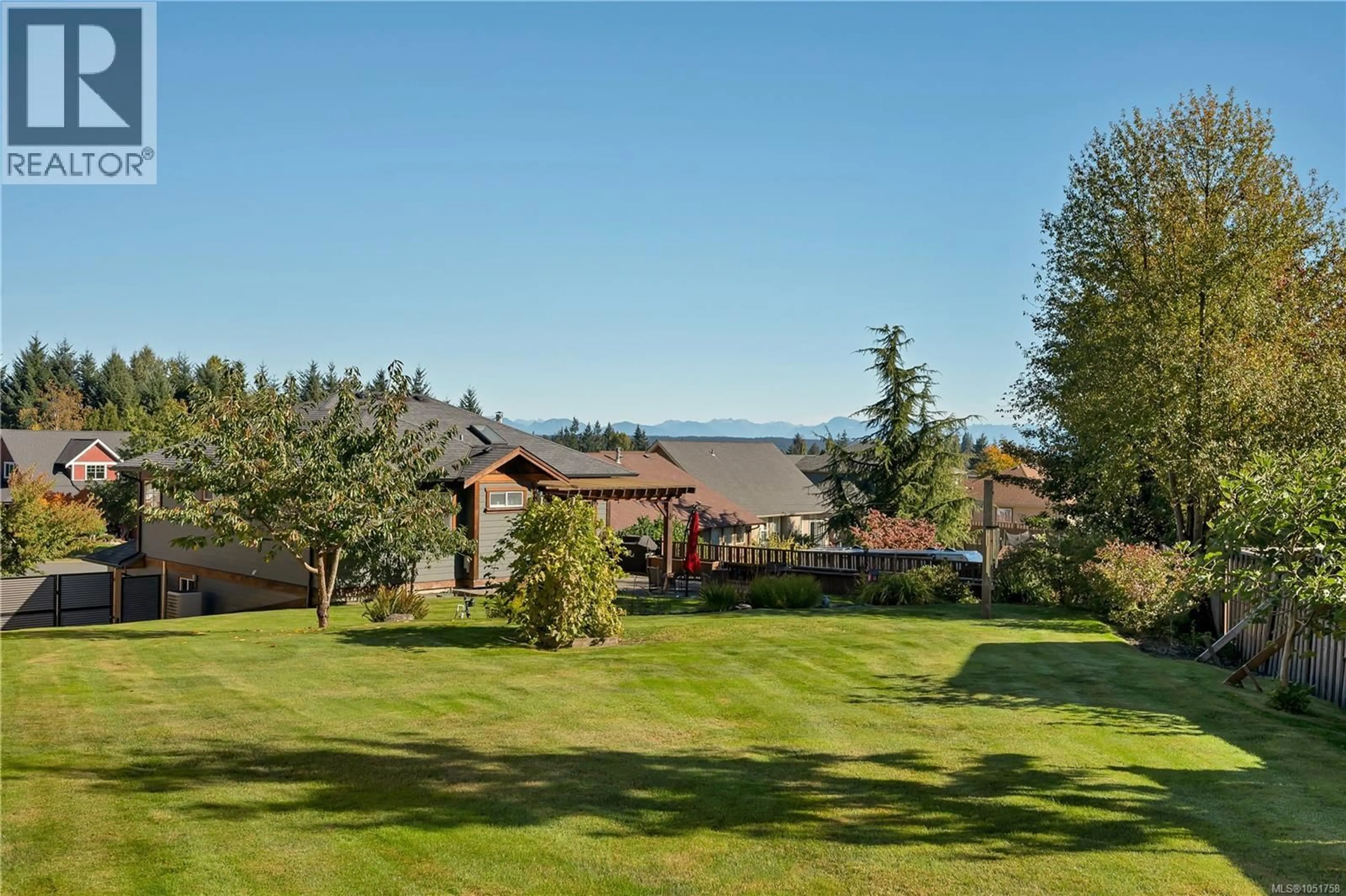 A pic from outside/outdoor area/front of a property/back of a property/a pic from drone, mountain view for 2012 VARSITY DRIVE, Campbell River British Columbia V9H1V2