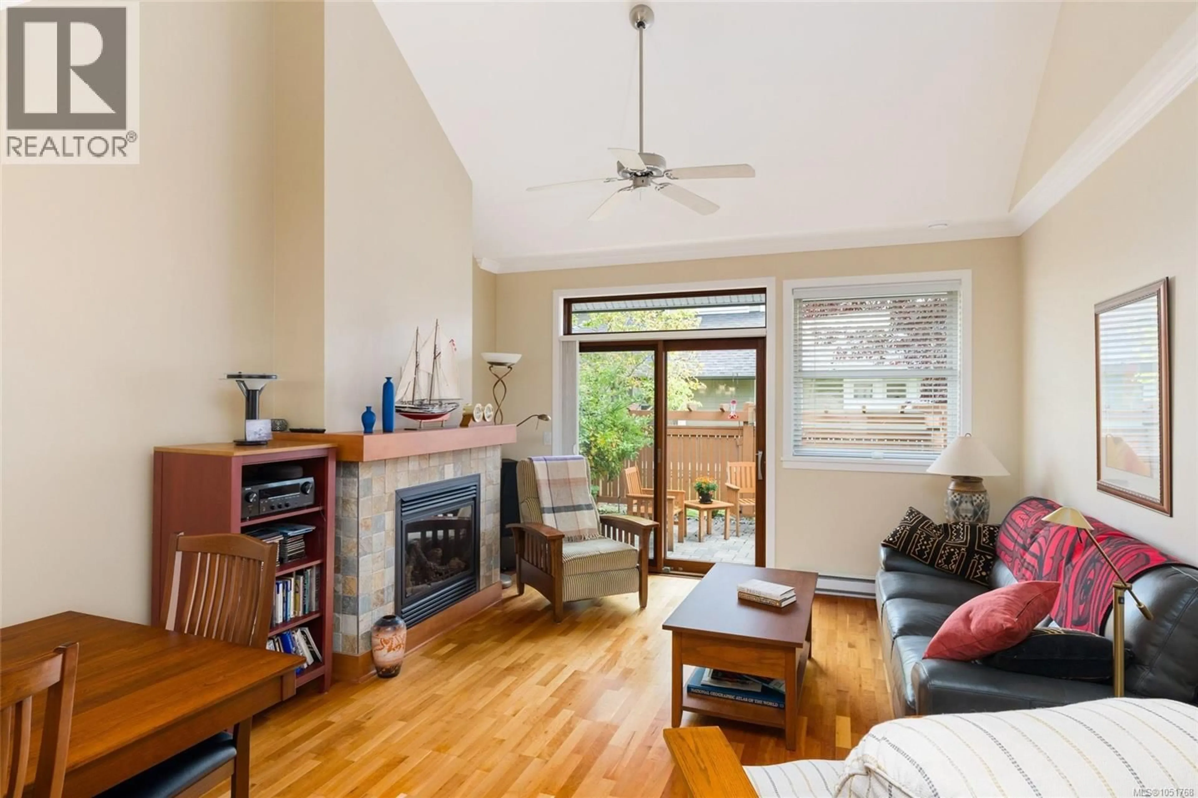 Living room with furniture, wood/laminate floor for 25 - 10520 MCDONALD PARK ROAD, North Saanich British Columbia V8L2R1