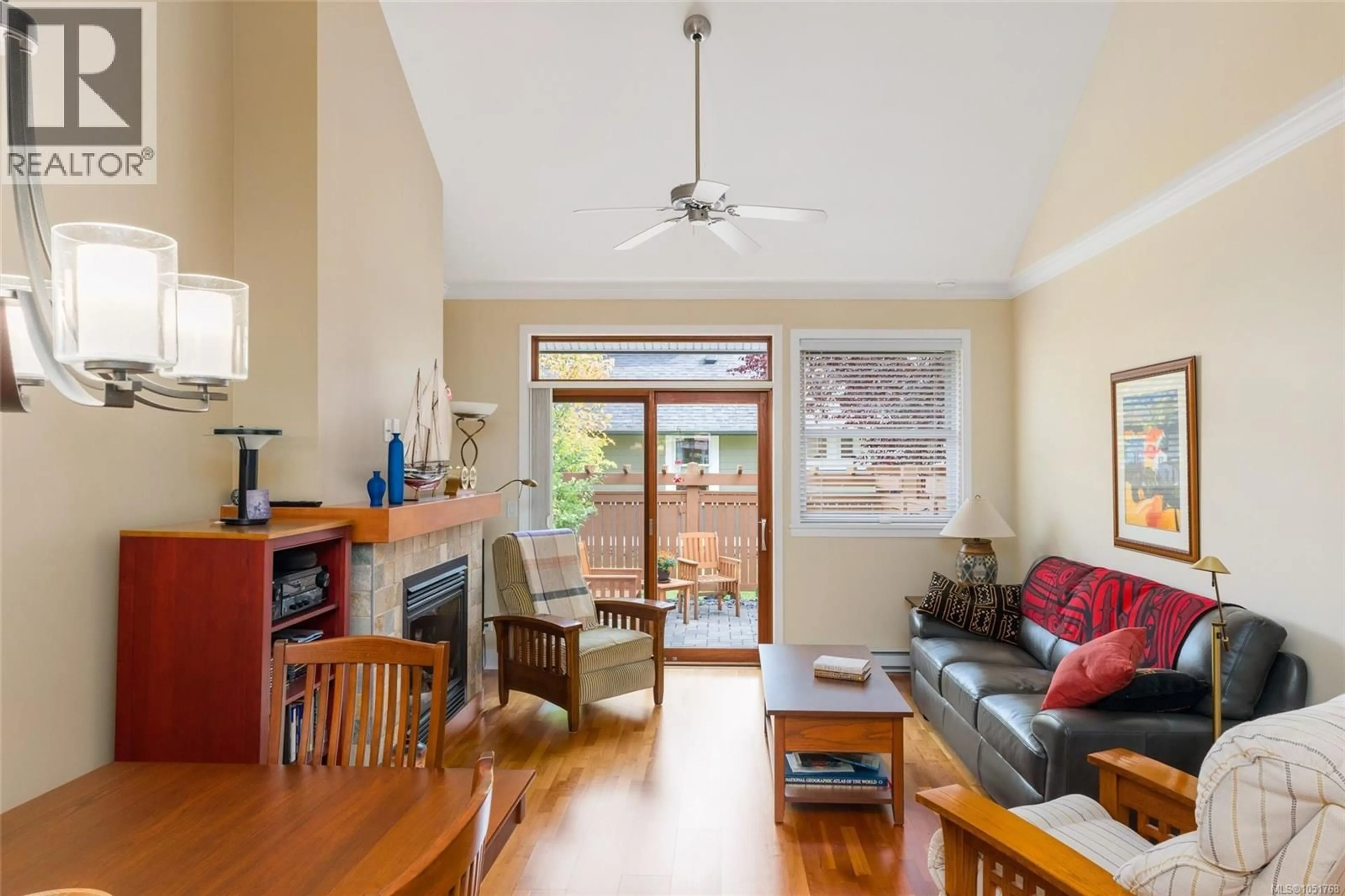 Living room with furniture, wood/laminate floor for 25 - 10520 MCDONALD PARK ROAD, North Saanich British Columbia V8L2R1