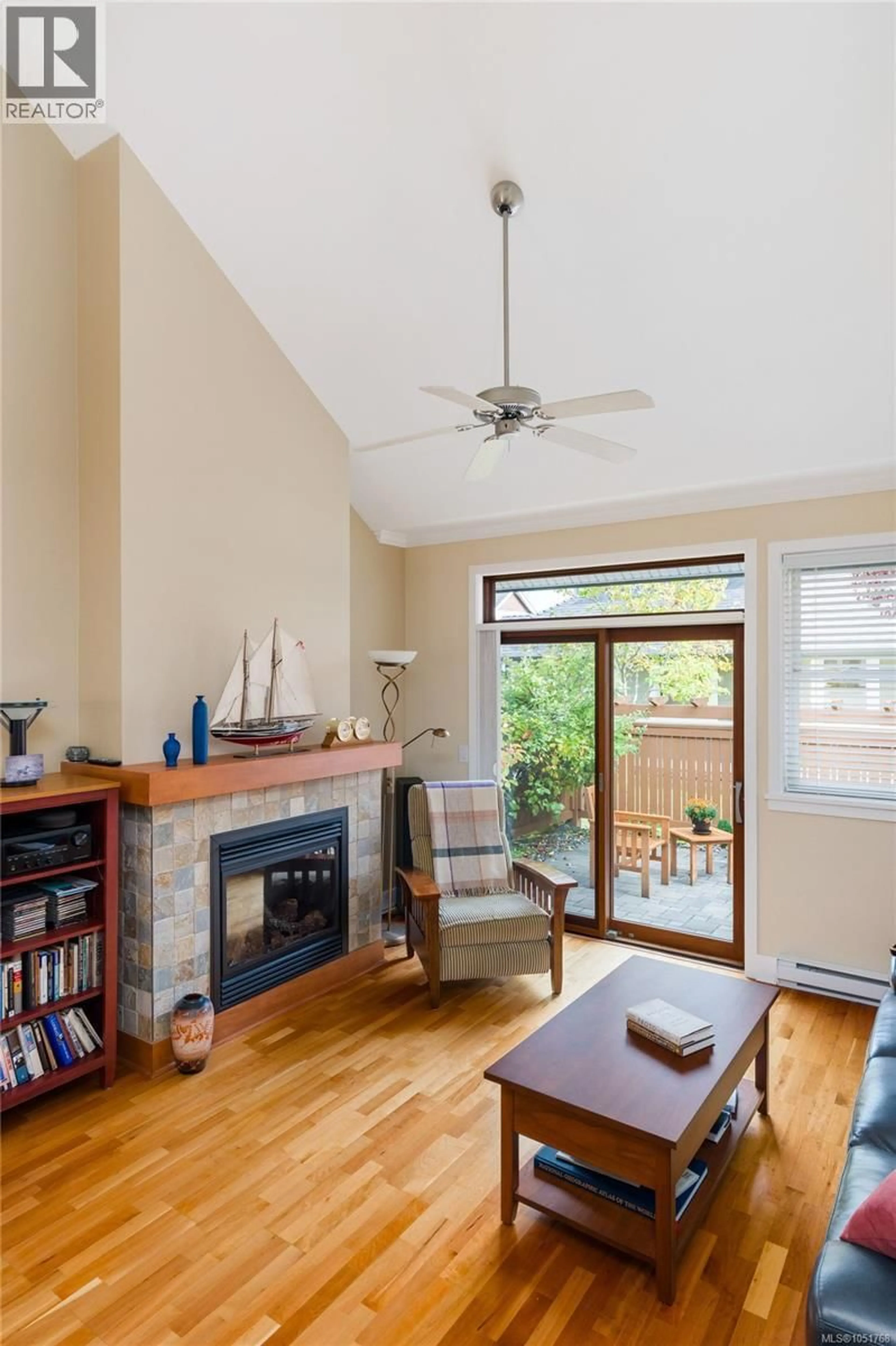 Living room with furniture, wood/laminate floor for 25 - 10520 MCDONALD PARK ROAD, North Saanich British Columbia V8L2R1