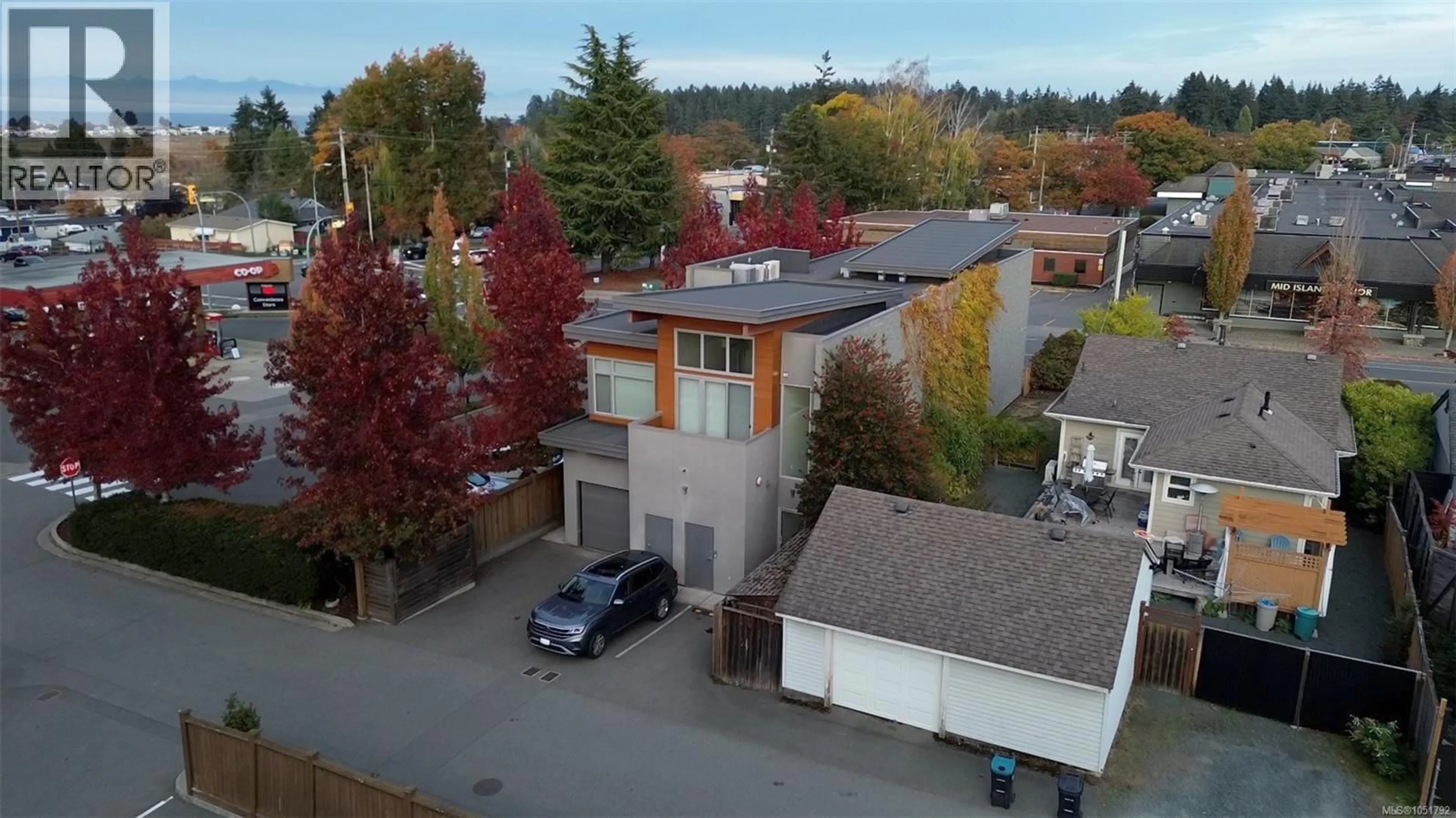 A pic from outside/outdoor area/front of a property/back of a property/a pic from drone, street for 201 - 139 CORFIELD STREET SOUTH, Parksville British Columbia V9P1A1