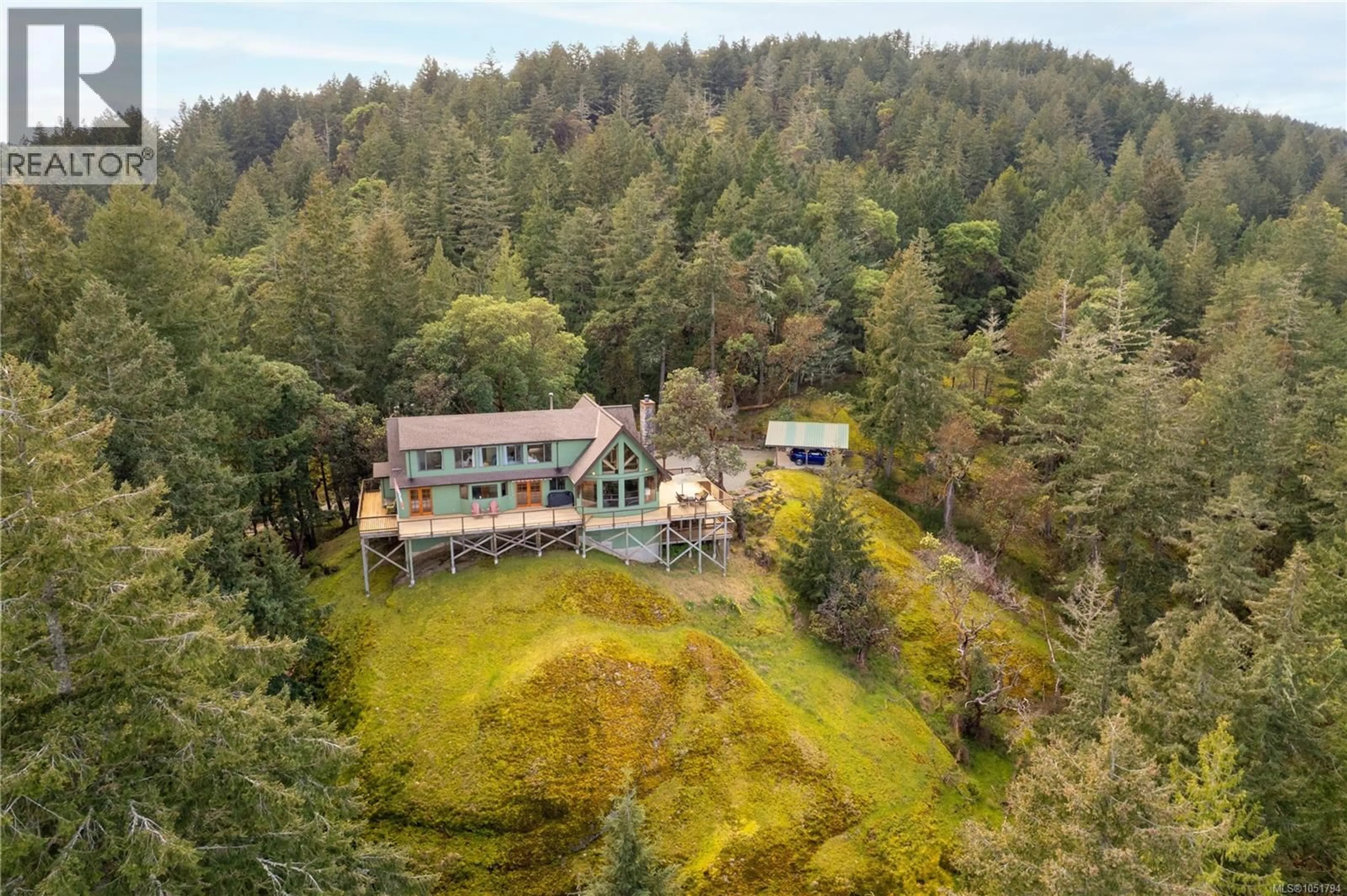 A pic from outside/outdoor area/front of a property/back of a property/a pic from drone, forest/trees view for 150 LIBERTY HALL LANE, Salt Spring British Columbia V8K2H1