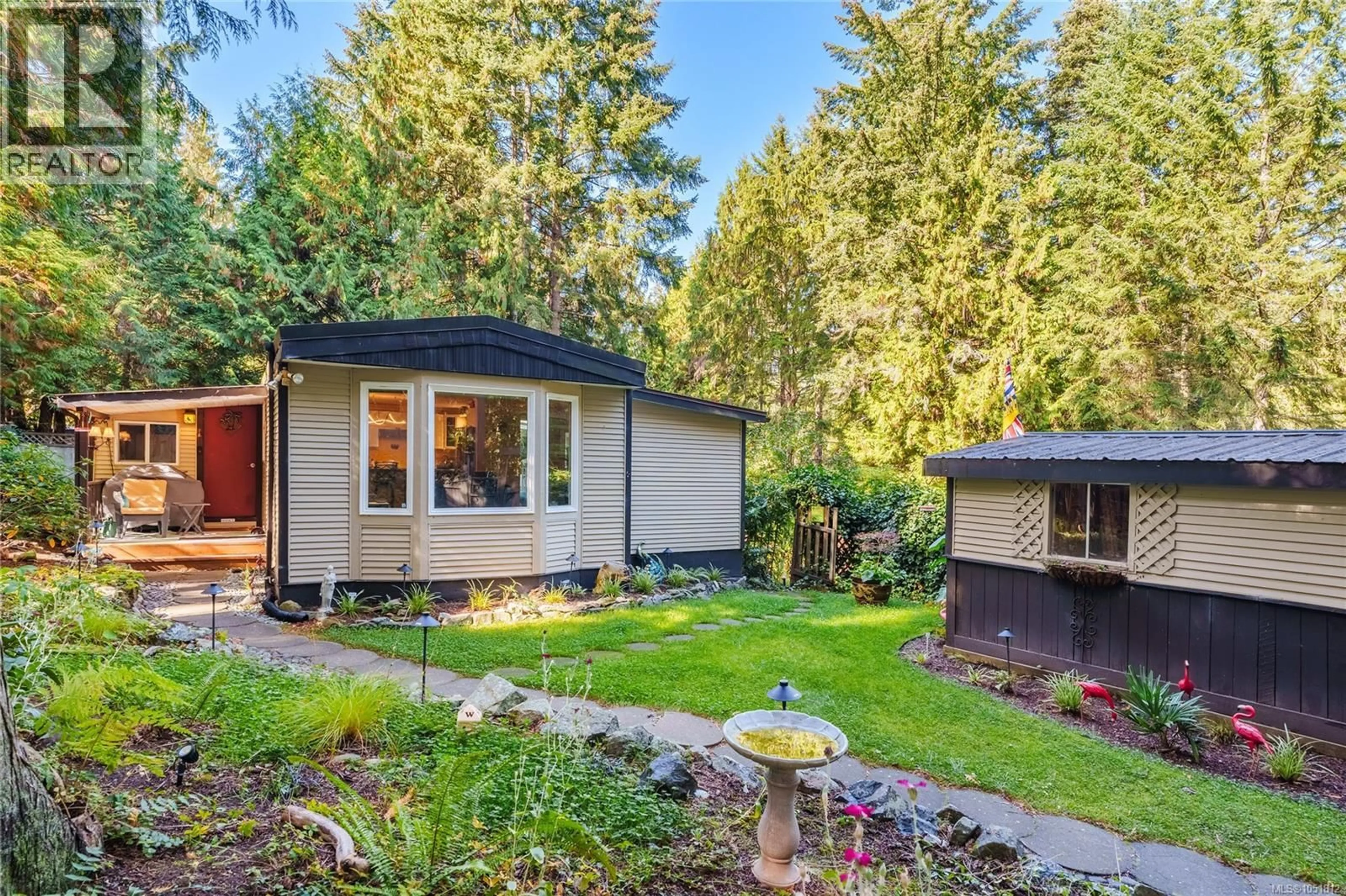 Home with vinyl exterior material, street for 21 - 7071 LANTZVILLE ROAD, Lantzville British Columbia V0R2H0