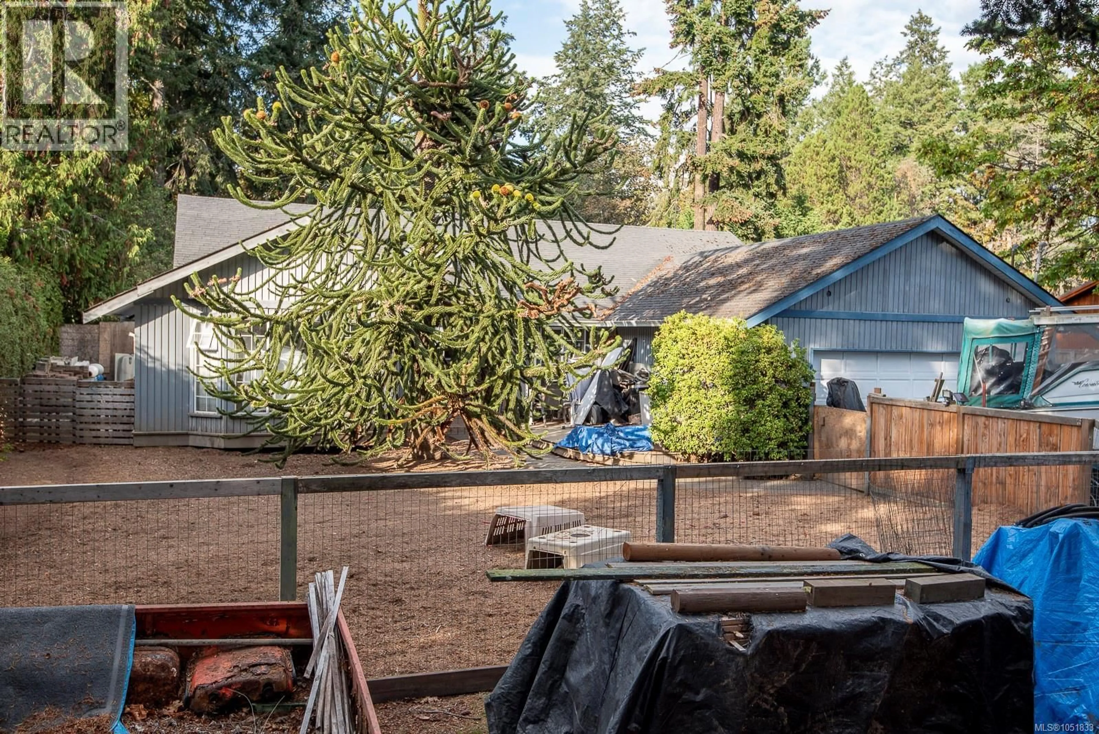 A pic from outside/outdoor area/front of a property/back of a property/a pic from drone, forest/trees view for 1706 MILLS ROAD, North Saanich British Columbia V8L5S9