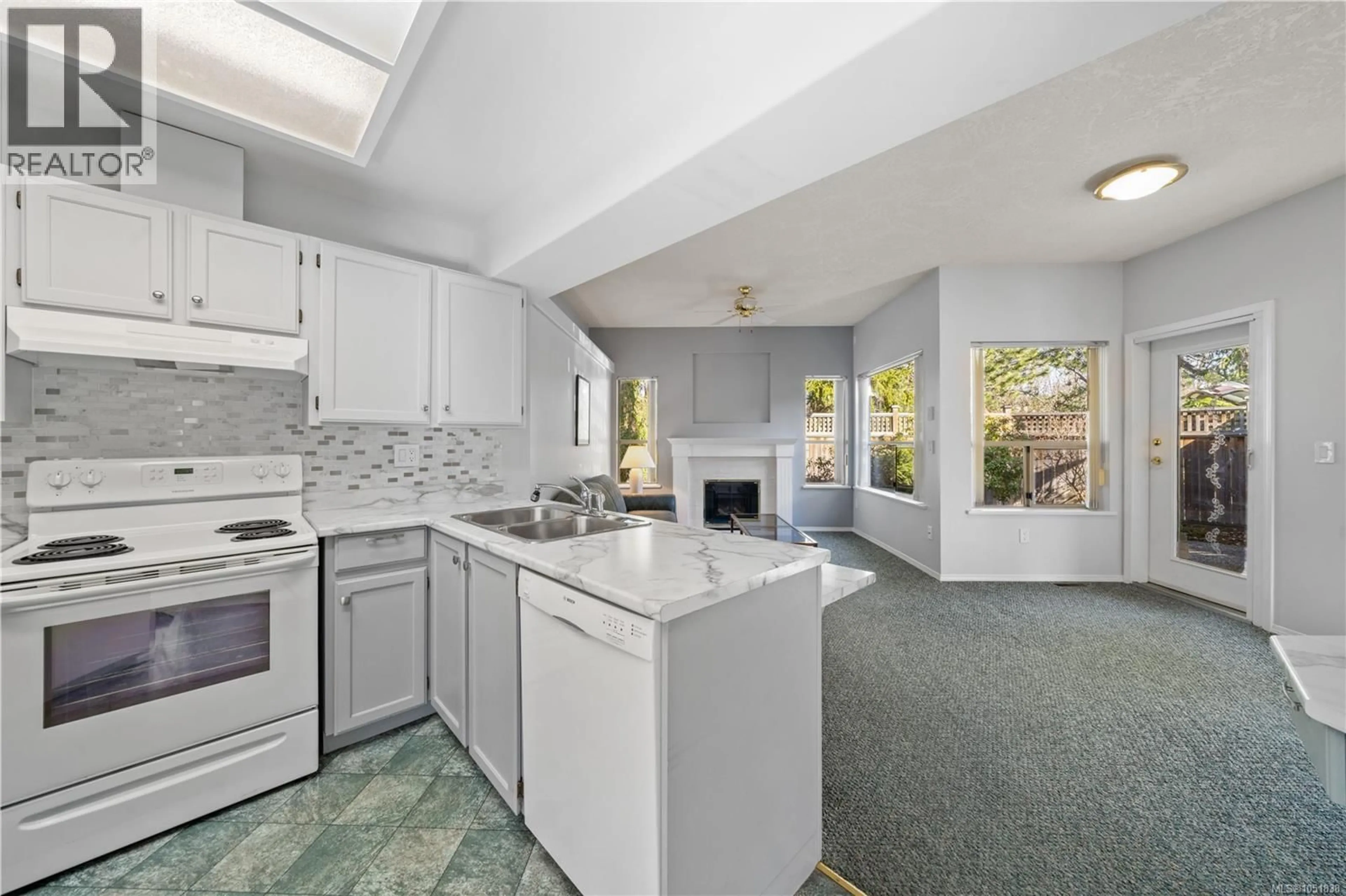 Open concept kitchen, ceramic/tile floor for 601 - 4515 PIPELINE ROAD, Saanich British Columbia V8Z5M3