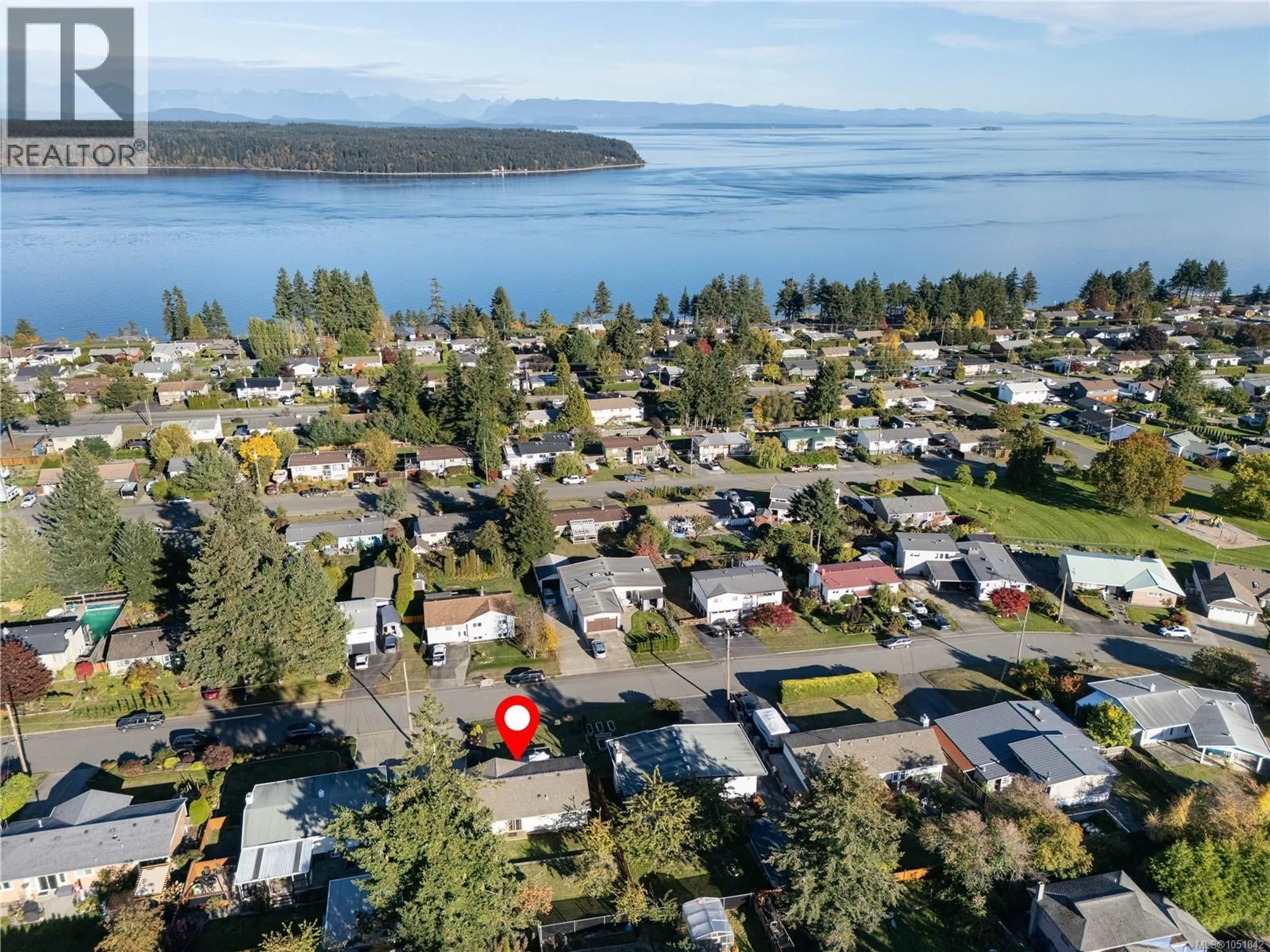 A pic from outside/outdoor area/front of a property/back of a property/a pic from drone, water/lake/river/ocean view for 766 NANCY GREENE DRIVE, Campbell River British Columbia V9W2A6