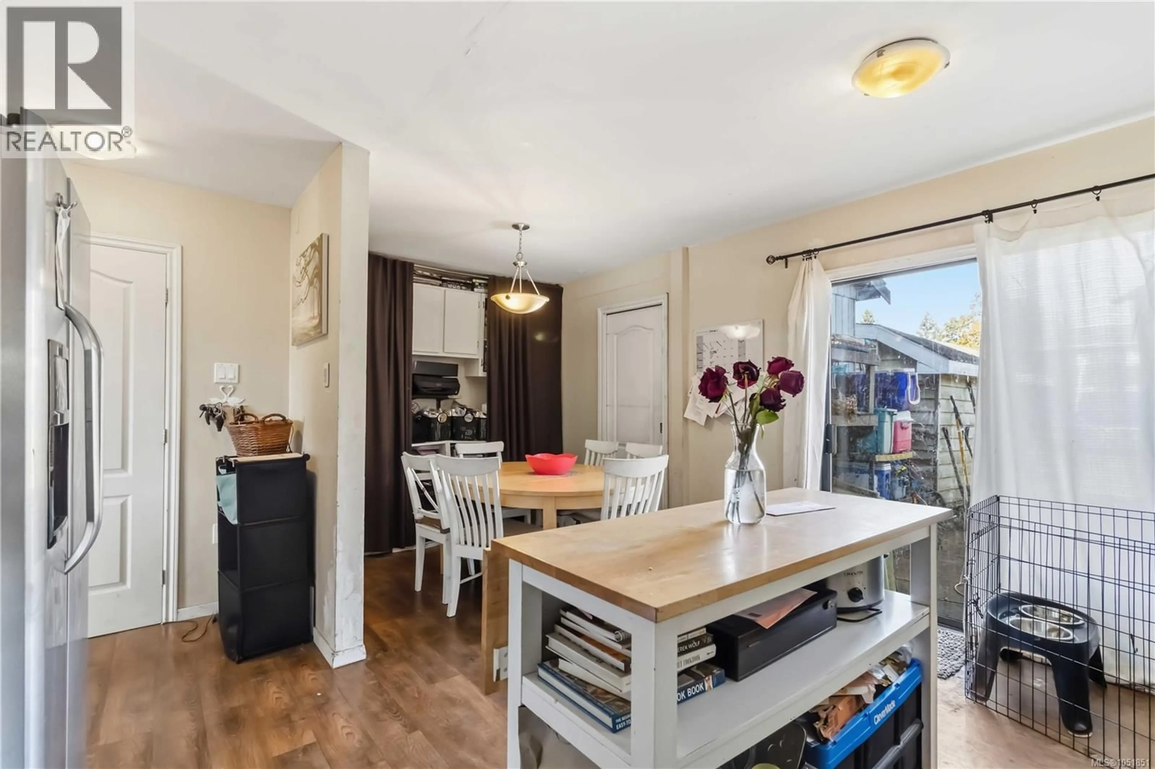 Open concept kitchen, wood/laminate floor for 1024 DUNFORD AVENUE, Langford British Columbia V9B2S5