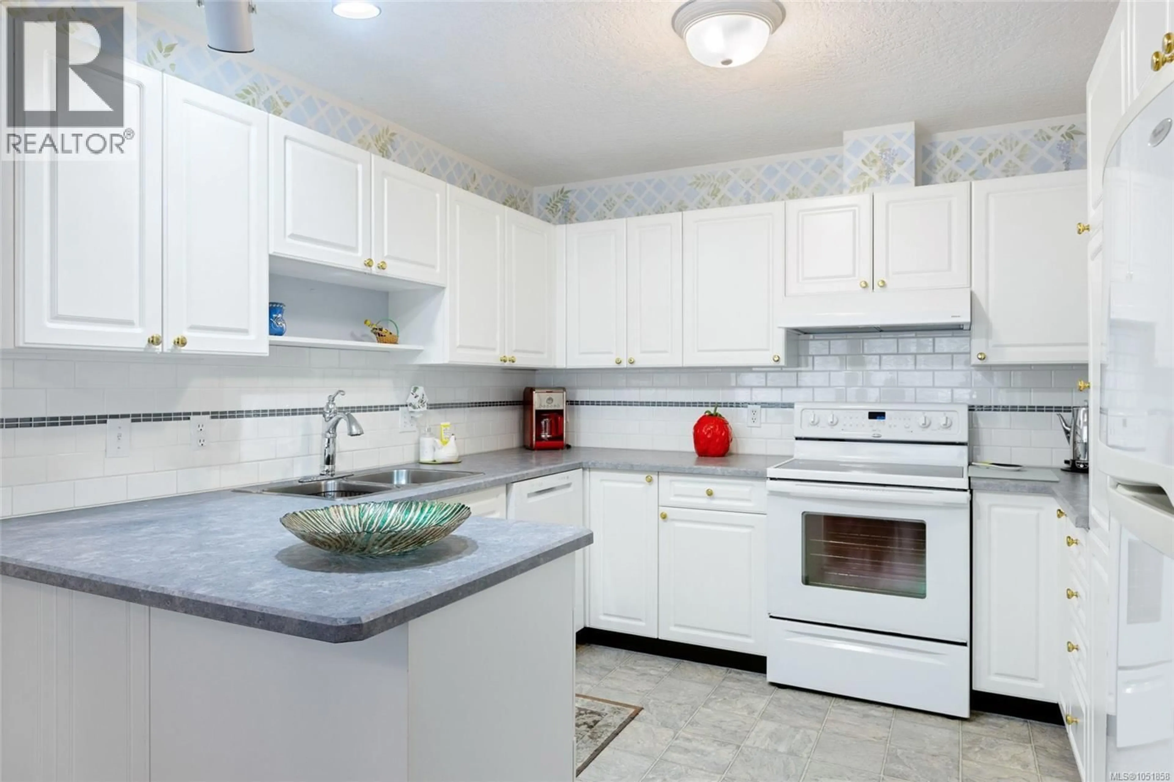 Standard kitchen, ceramic/tile floor for 13 - 4619 ELK LAKE DRIVE, Saanich British Columbia V8Z5M2