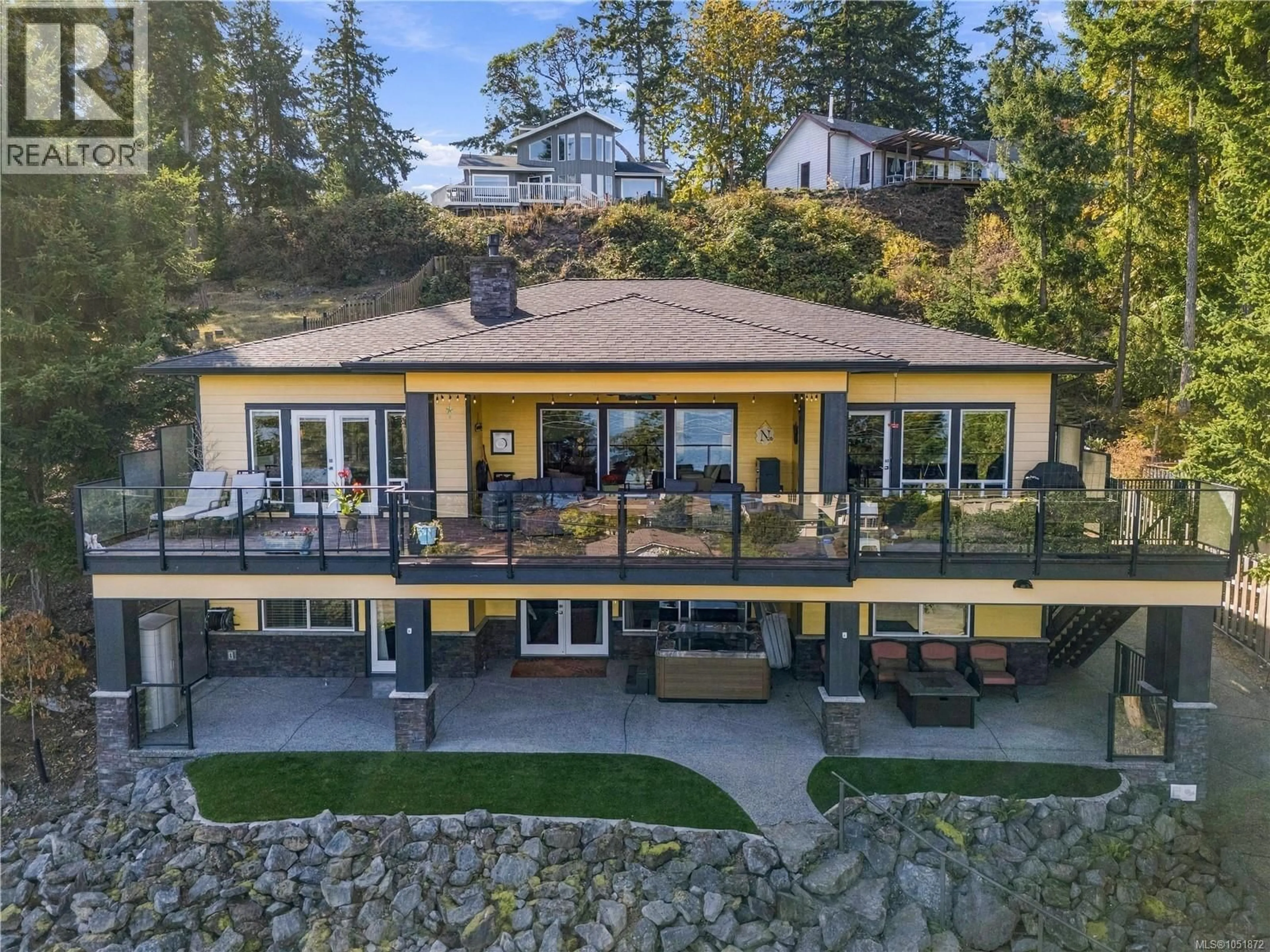 A pic from outside/outdoor area/front of a property/back of a property/a pic from drone, water/lake/river/ocean view for 3030 DOLPHIN DRIVE, Nanoose Bay British Columbia V9P9J3