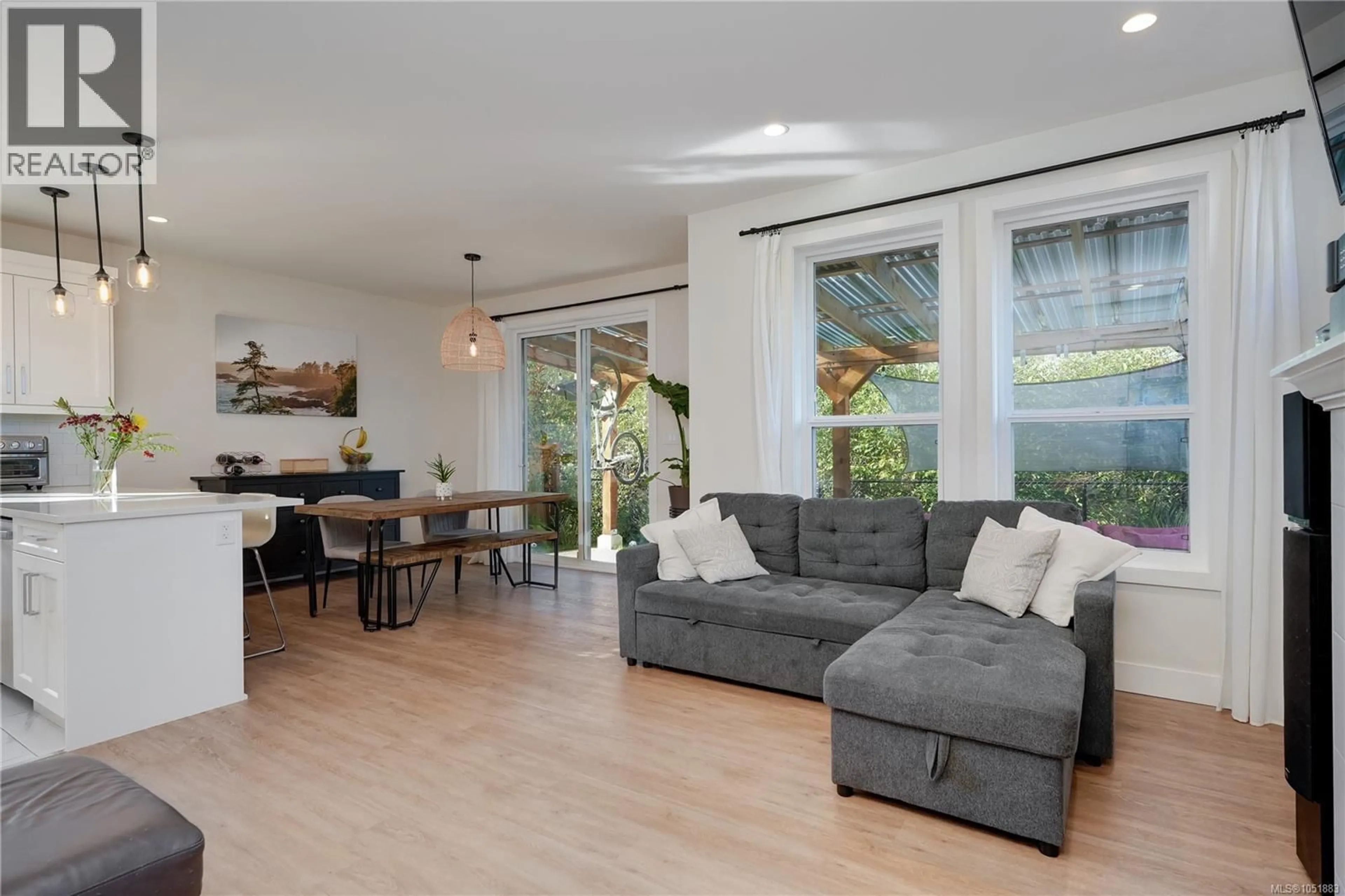 Living room with furniture, wood/laminate floor for 1064 GAMMON WAY, Shawnigan Lake British Columbia V0R2W3