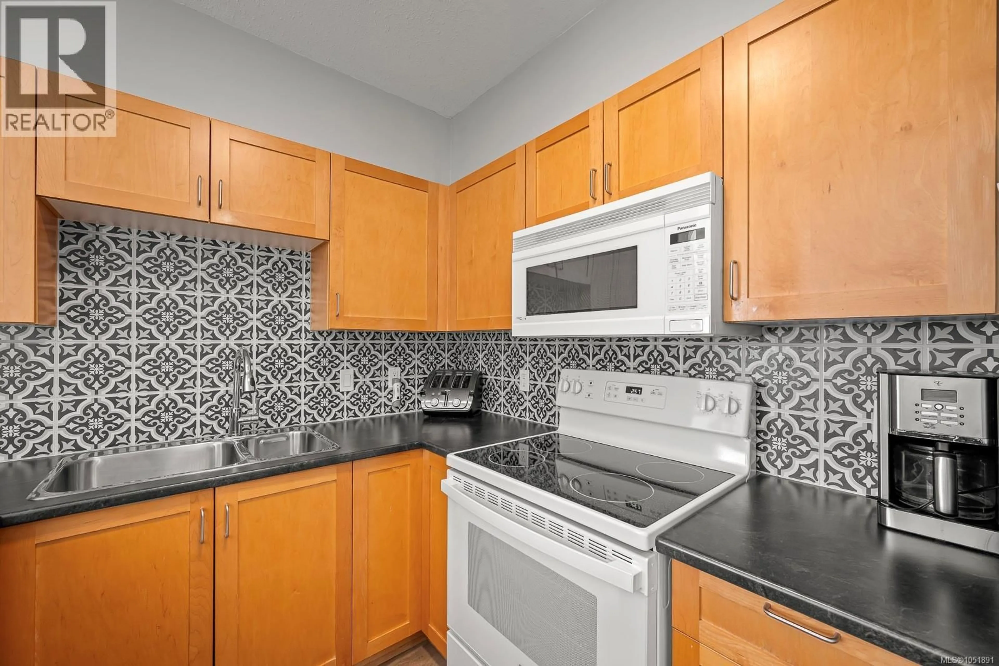 Standard kitchen, ceramic/tile floor for 111 - 1280 ALPINE ROAD, Courtenay British Columbia V9J1L0